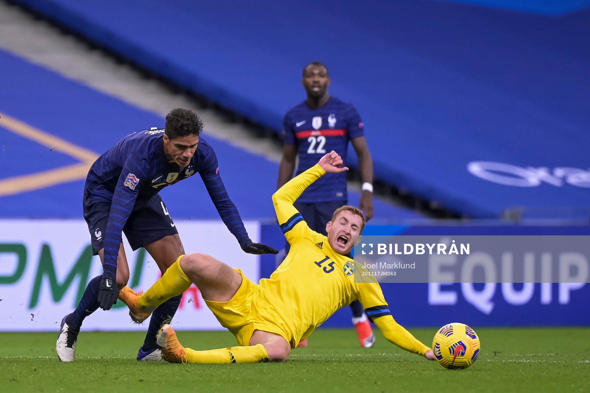 Raphael Varane of France and Dejan Kulusevski of Sweden
