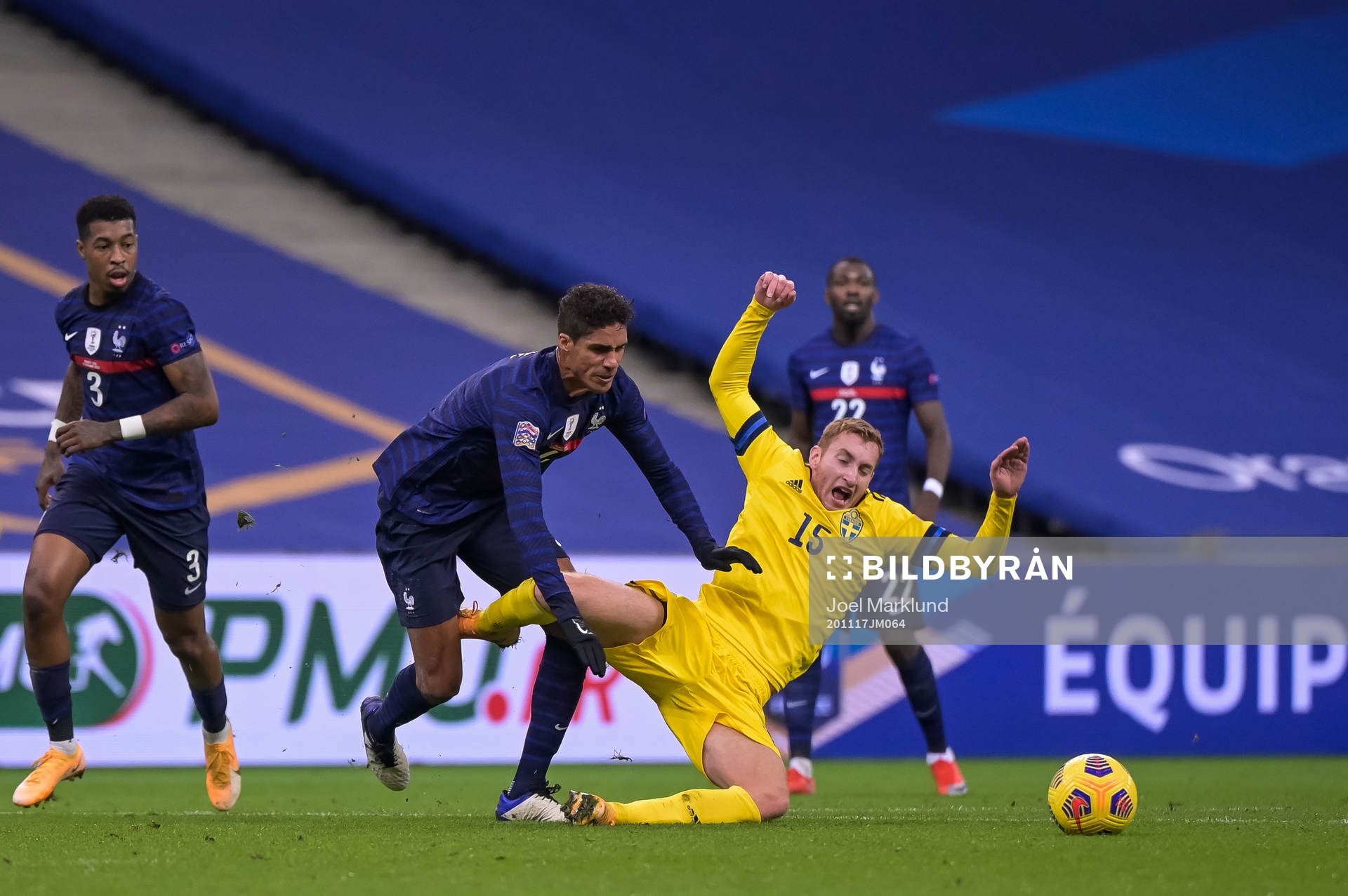 Raphael Varane of France and Dejan Kulusevski of Sweden