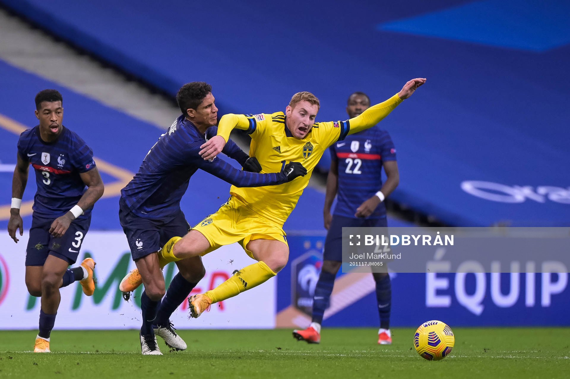 Raphael Varane of France and Dejan Kulusevski of Sweden