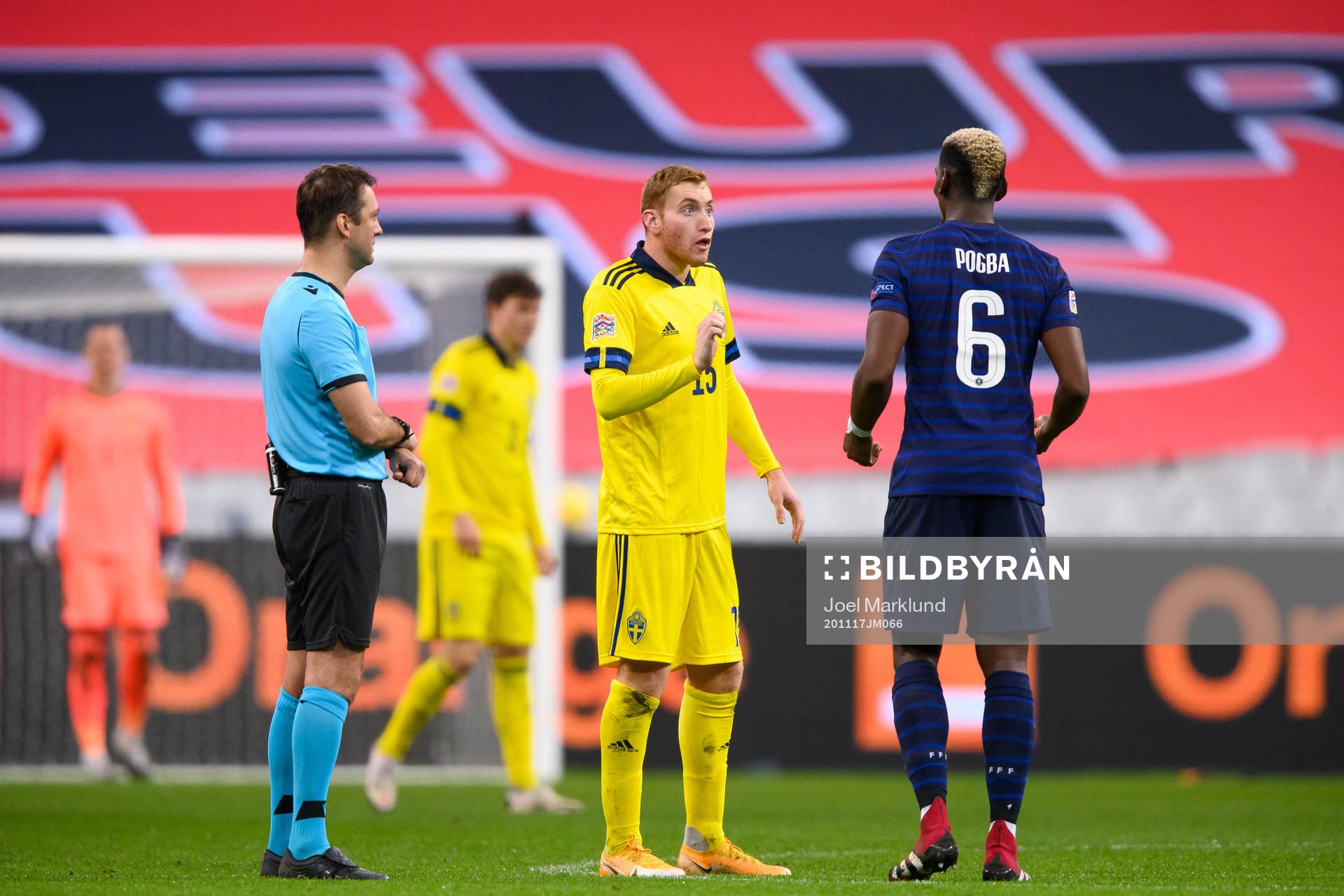 Dejan Kulusevski of Sweden and Paul Pogba of France