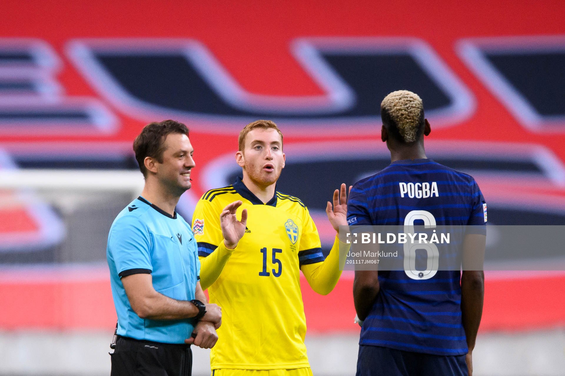 Dejan Kulusevski of Sweden and Paul Pogba of France