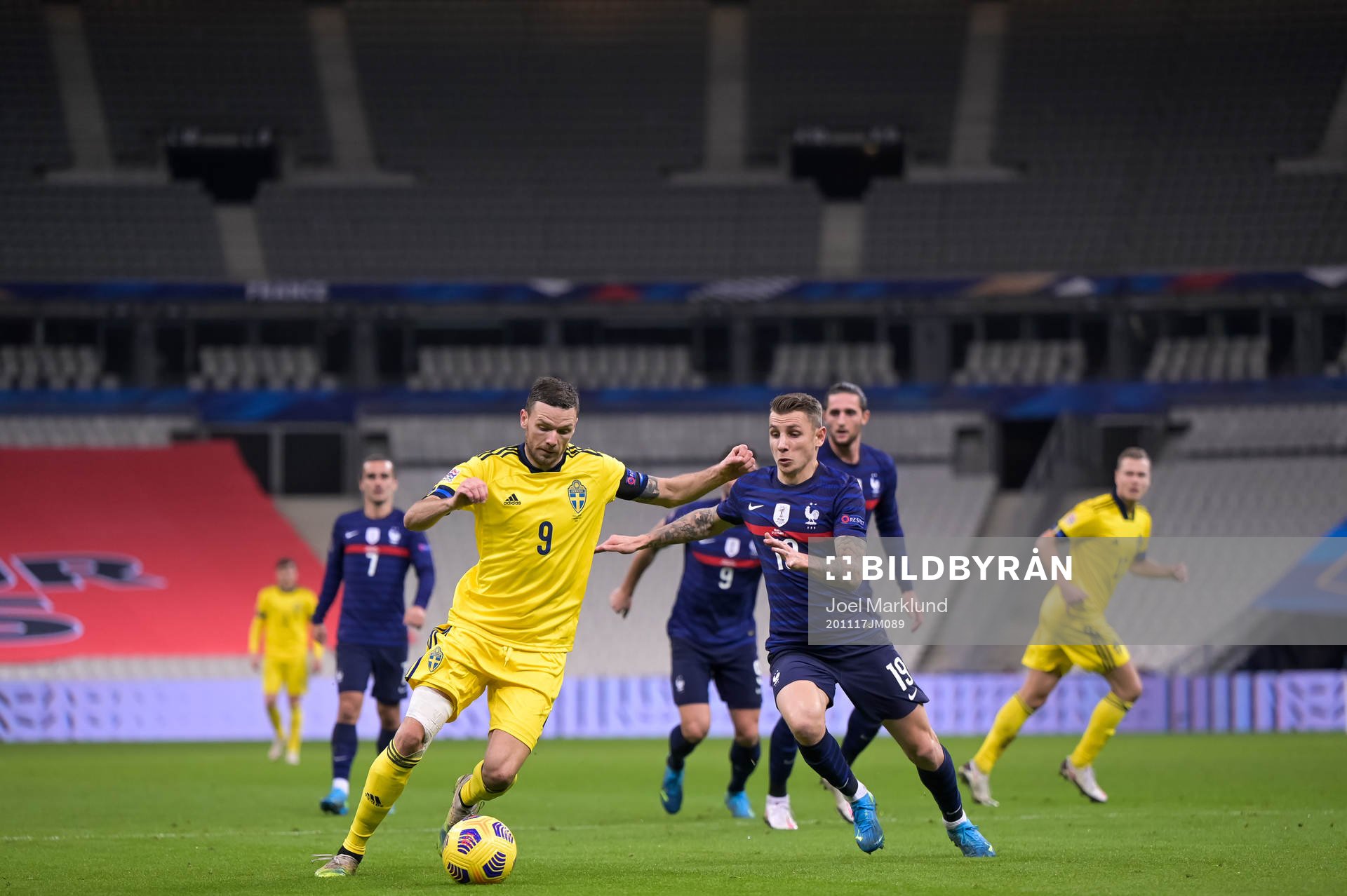 Marcus Berg of Sweden and Lucas Digne of France