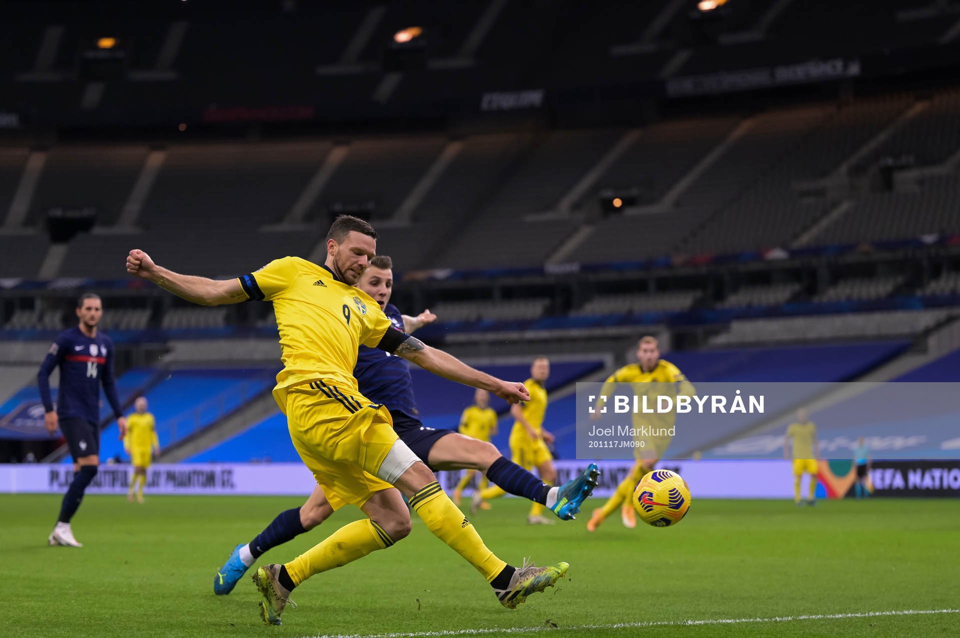 Marcus Berg of Sweden and Lucas Digne of France
