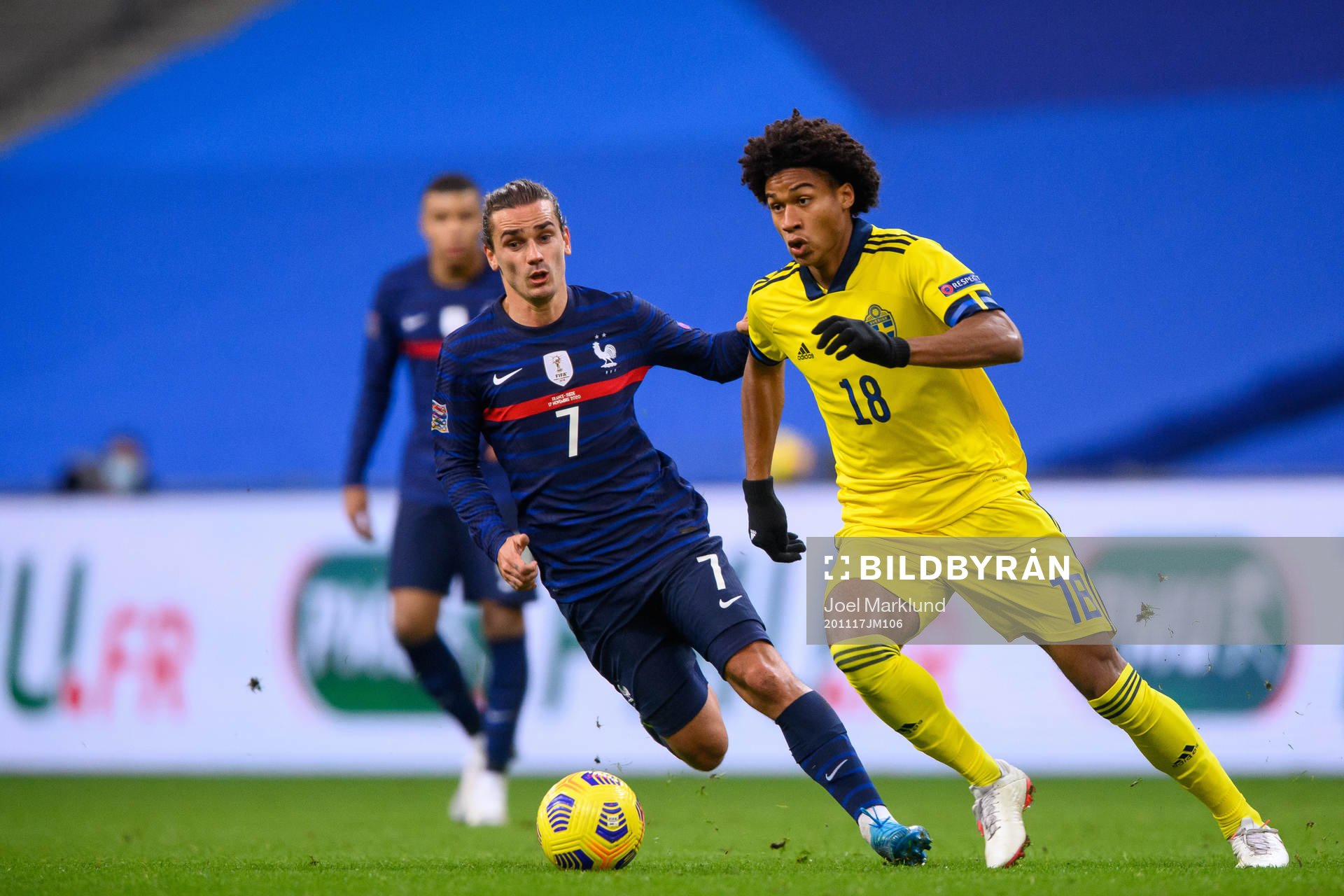 Antoine Griezmann of France and Jens-Lys Cajuste of Sweden