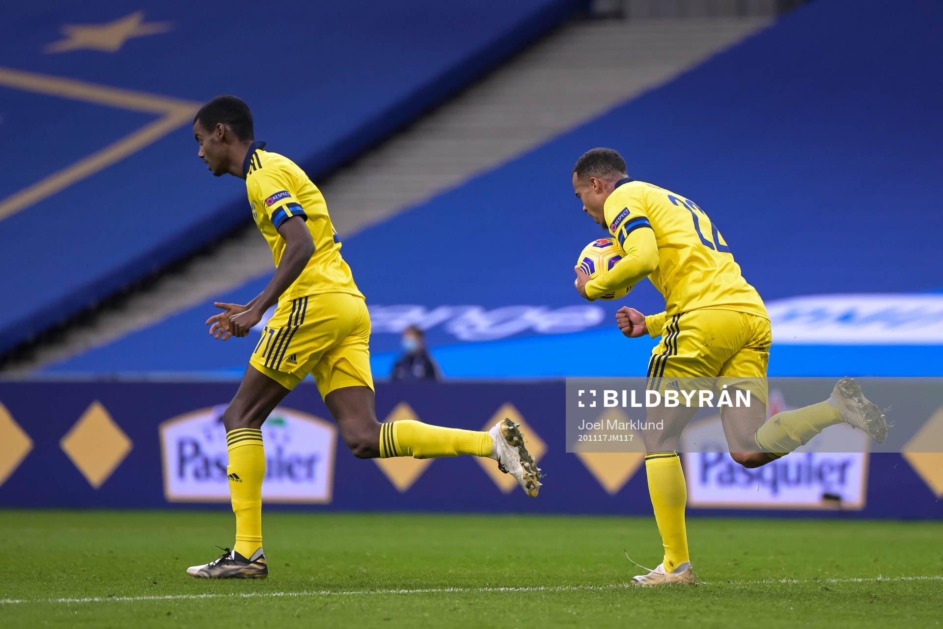 Alexander Isak and Robin Quaison of Sweden celebrate the