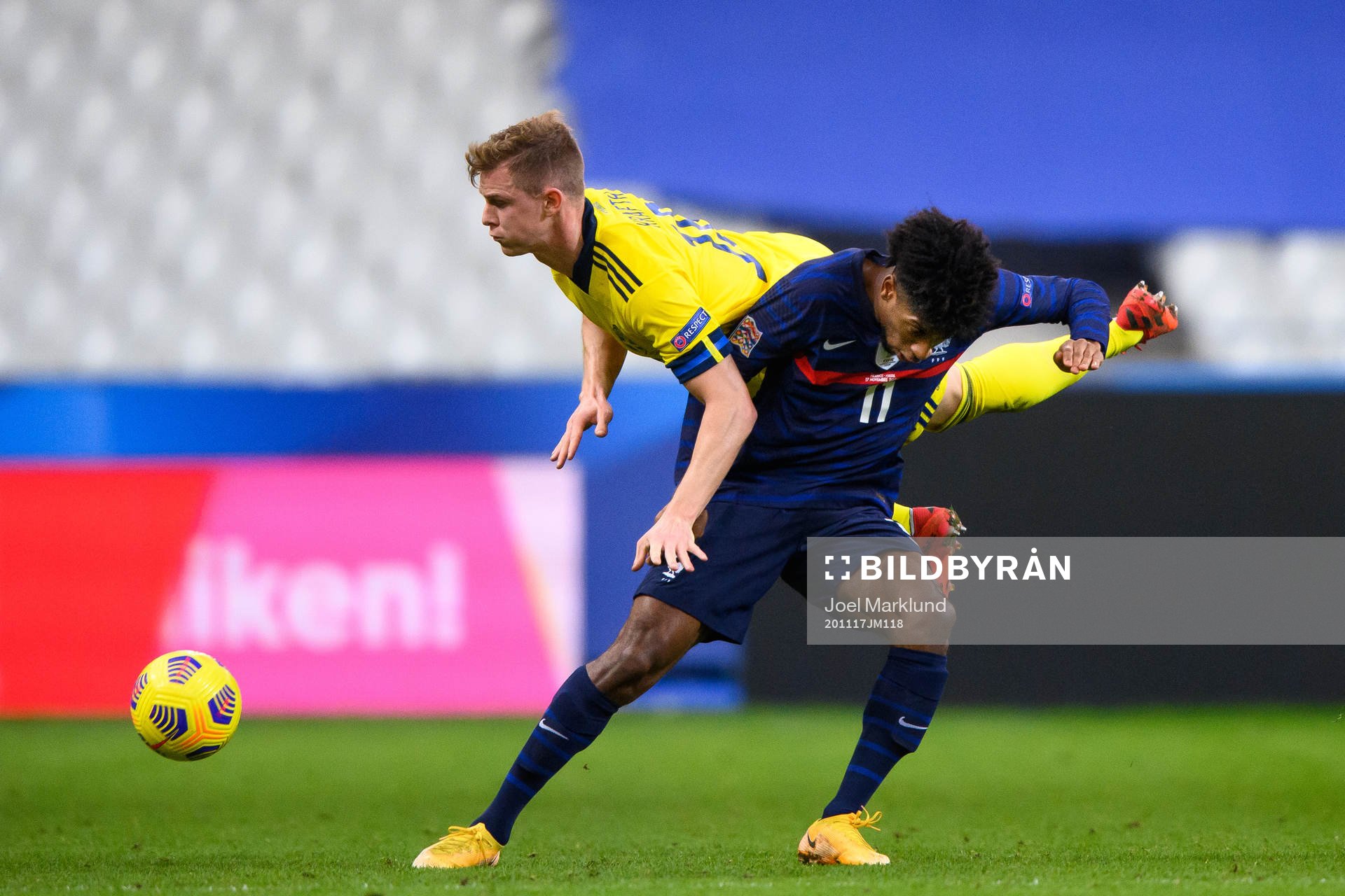 Emil Krafth of Sweden and Kingsley Coman of France