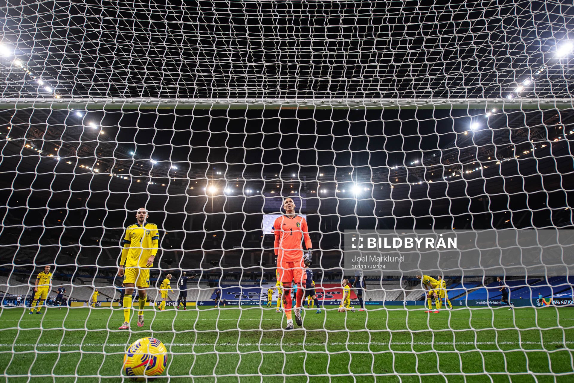 Marcus Danielson and goalkeeper Robin Olsen of Sweden look
