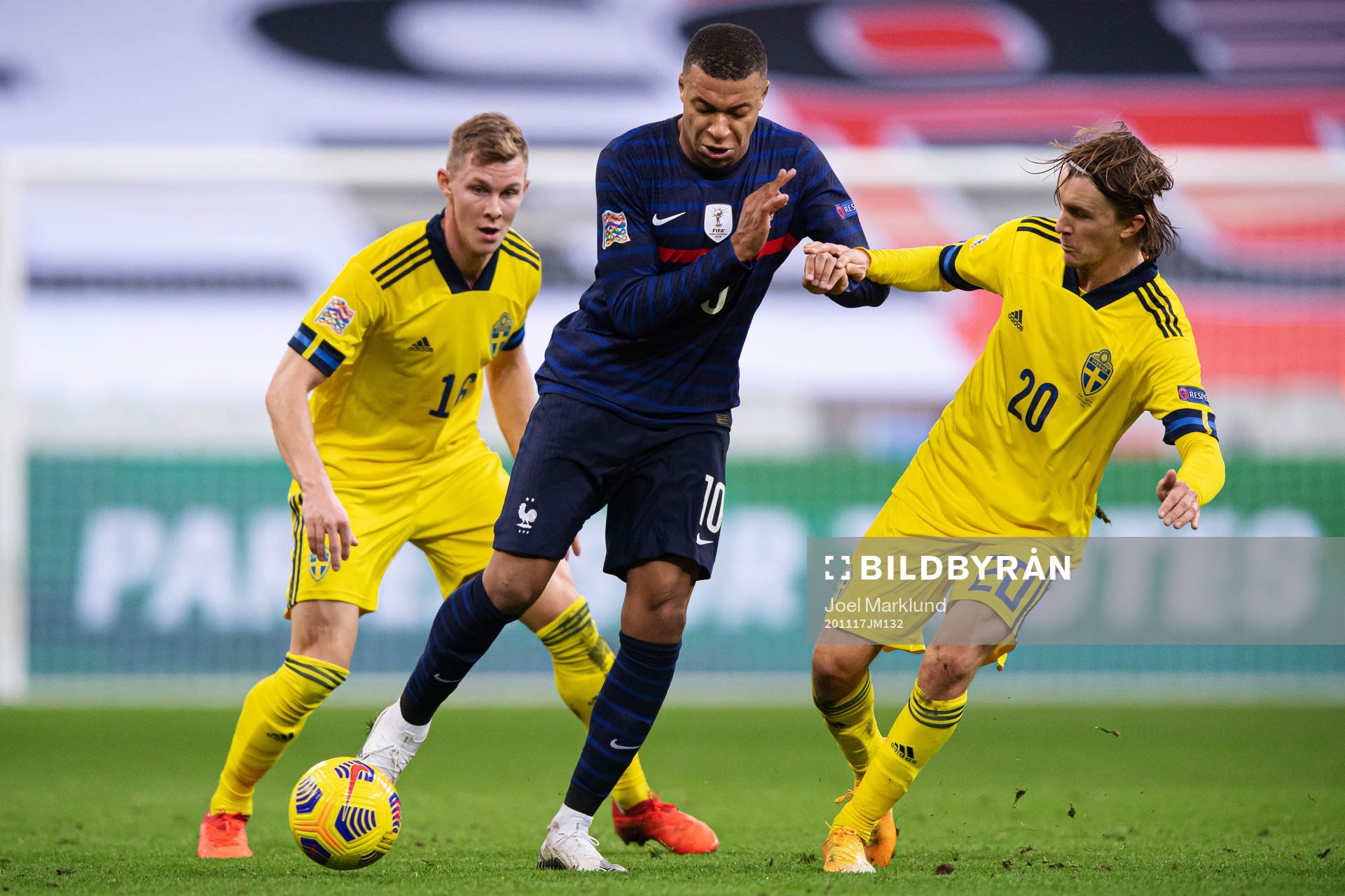 Emil Krafth and Kristoffer Olsson of Sweden are being