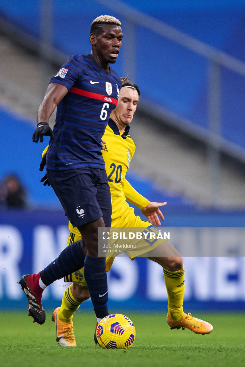Paul Pogba of France and Kristoffer Olsson of Sweden