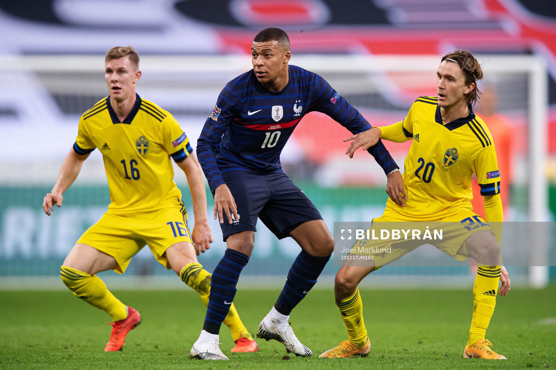Emil Krafth and Kristoffer Olsson of Sweden and Kylian