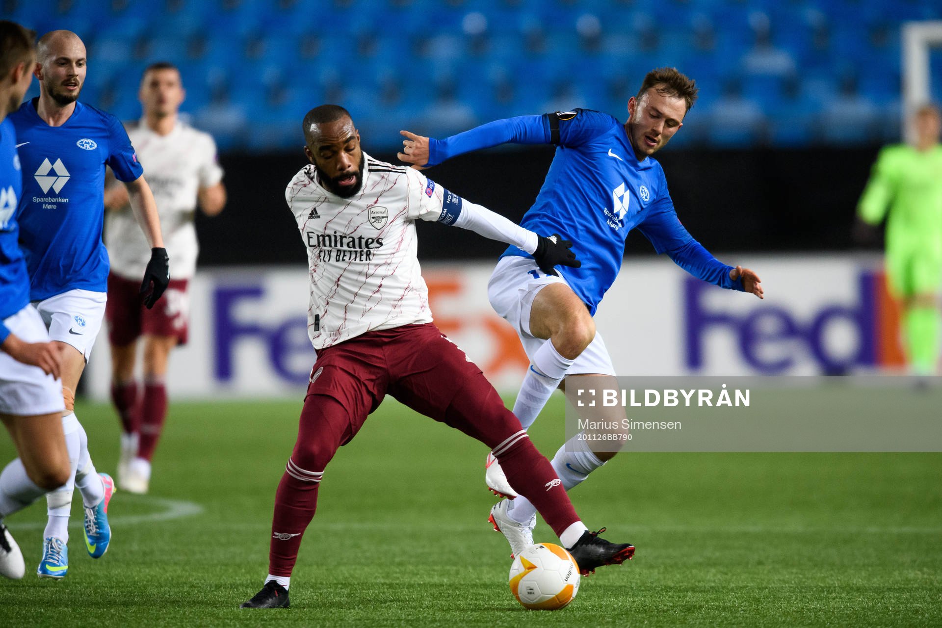 Alexandre Lacazette of Arsenal and Fredrik Aursnes of Molde