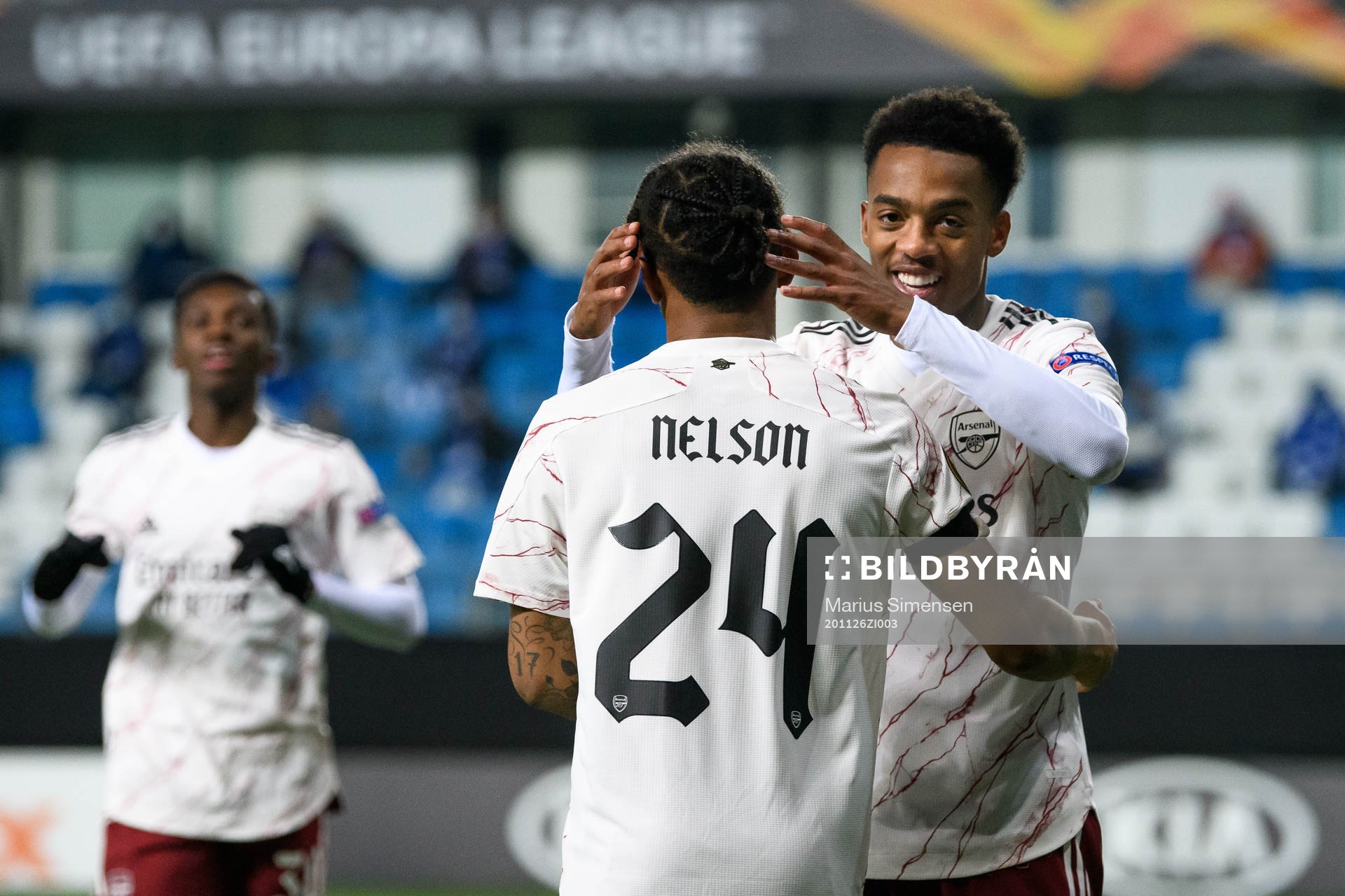 Reiss Nelson and Joe Willock of Arsenal celebrate the 0-2