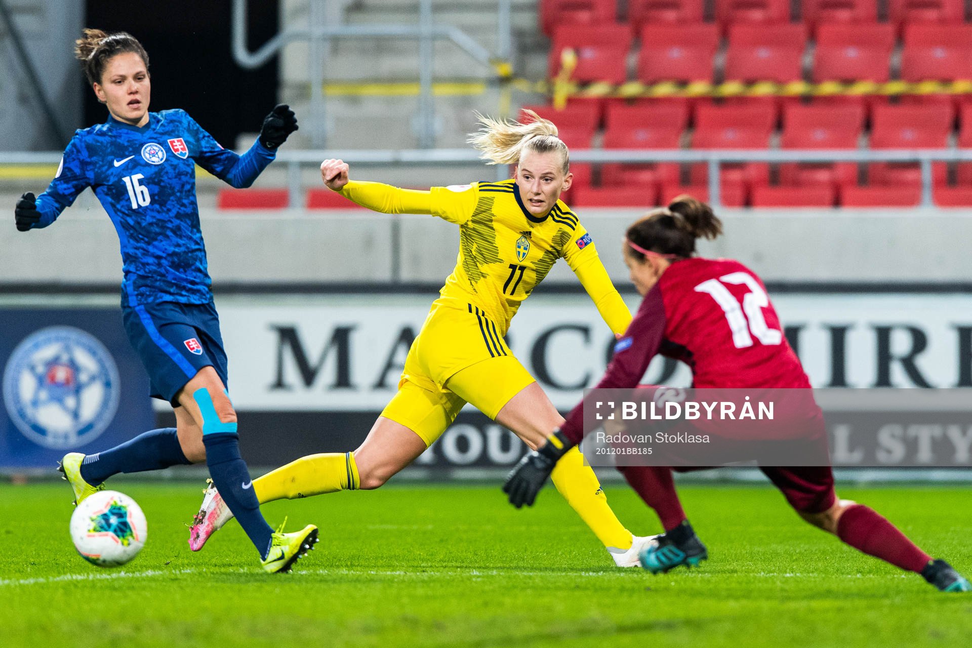 Diana Bartovičová and goalkeeper 12 Maria Korenčiová