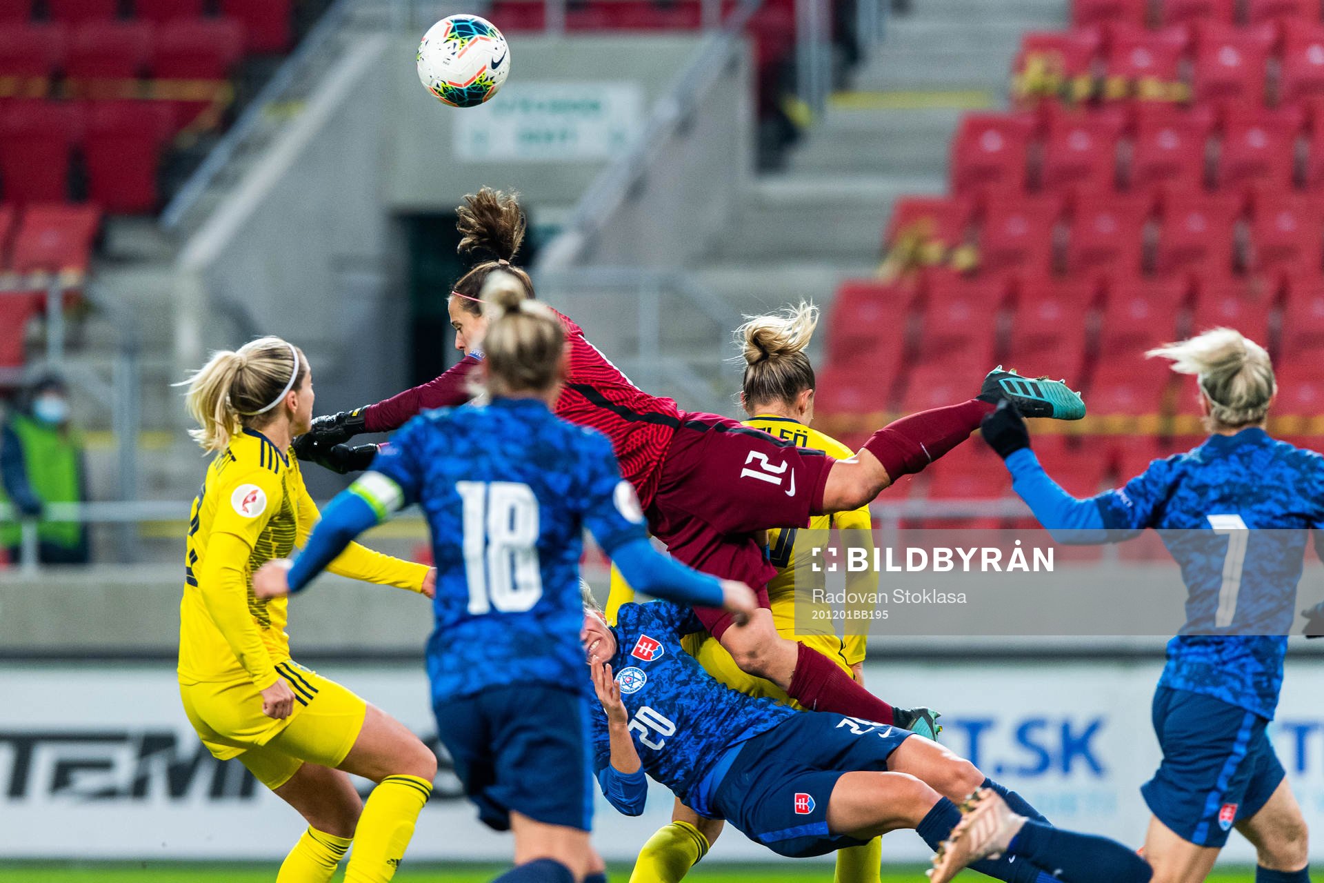 Andrea Horváthová and goalkeeper 12 Maria Korenčiová of