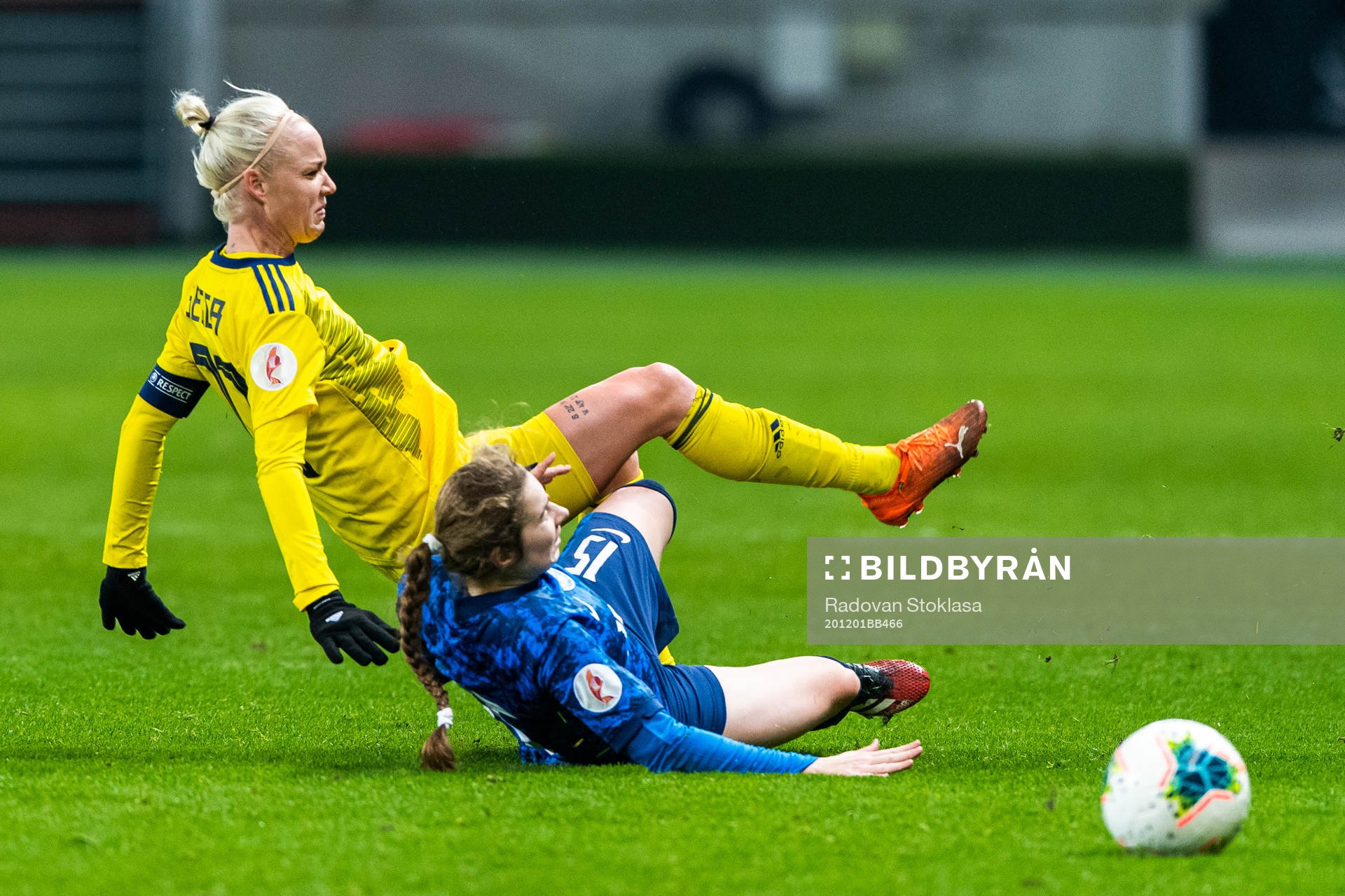 Caroline Seger of Sweden is tackled by Laura Žemberyová
