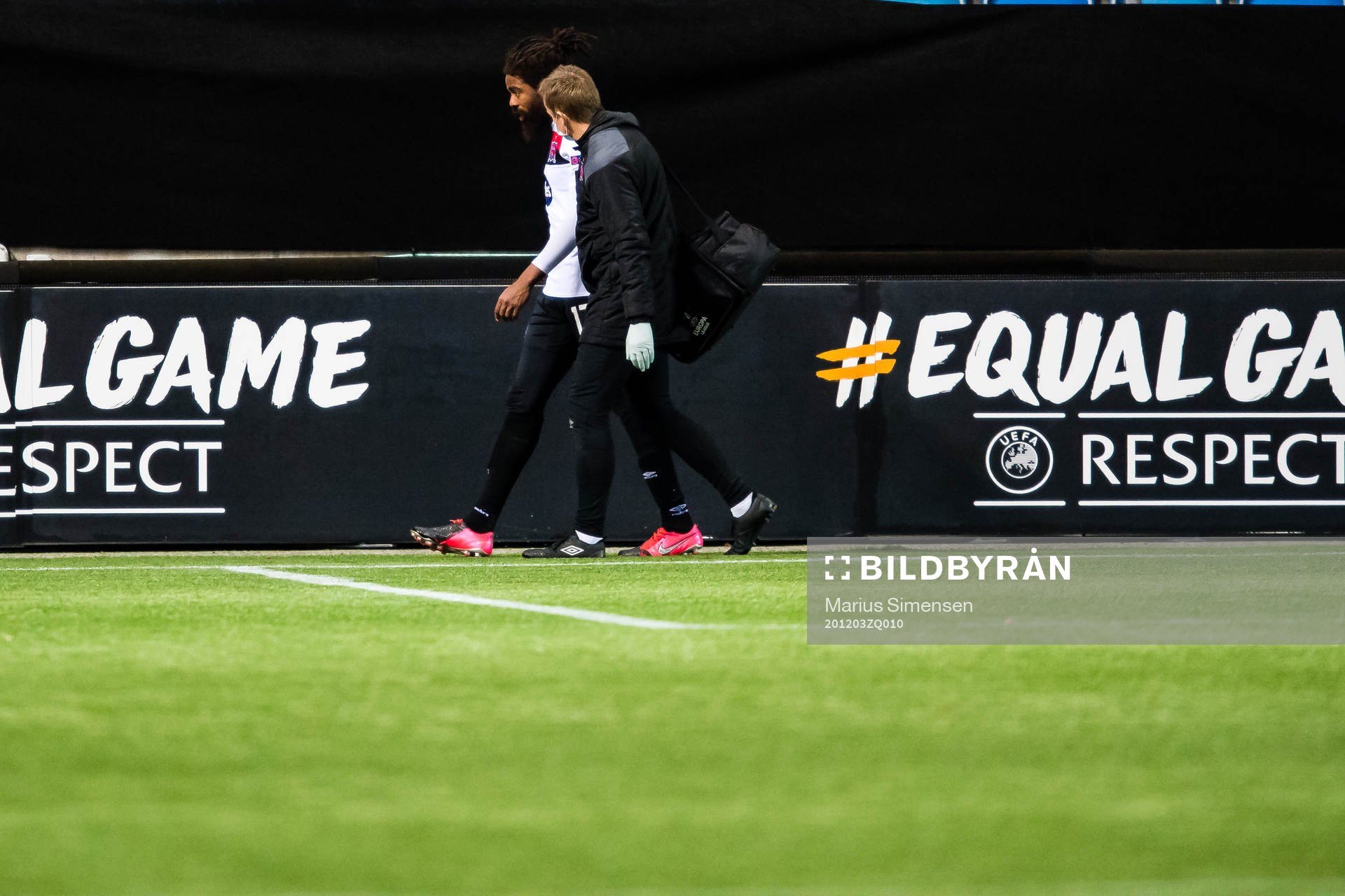 Nathan Oduwa of Dundalk walks off with an injury