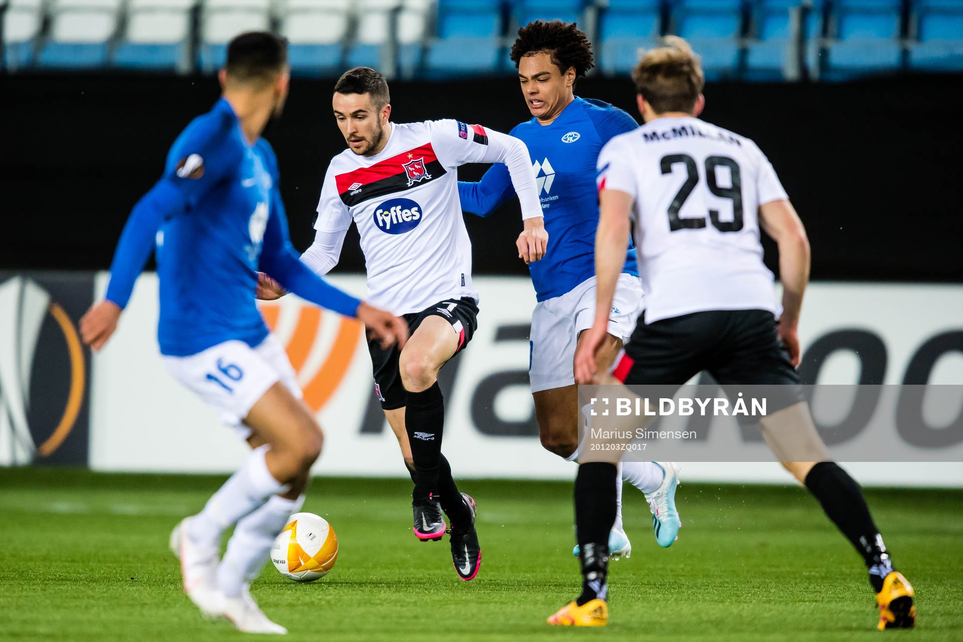 Michael Duffy of Dundalk and Henry Swenson Wingo of Molde
