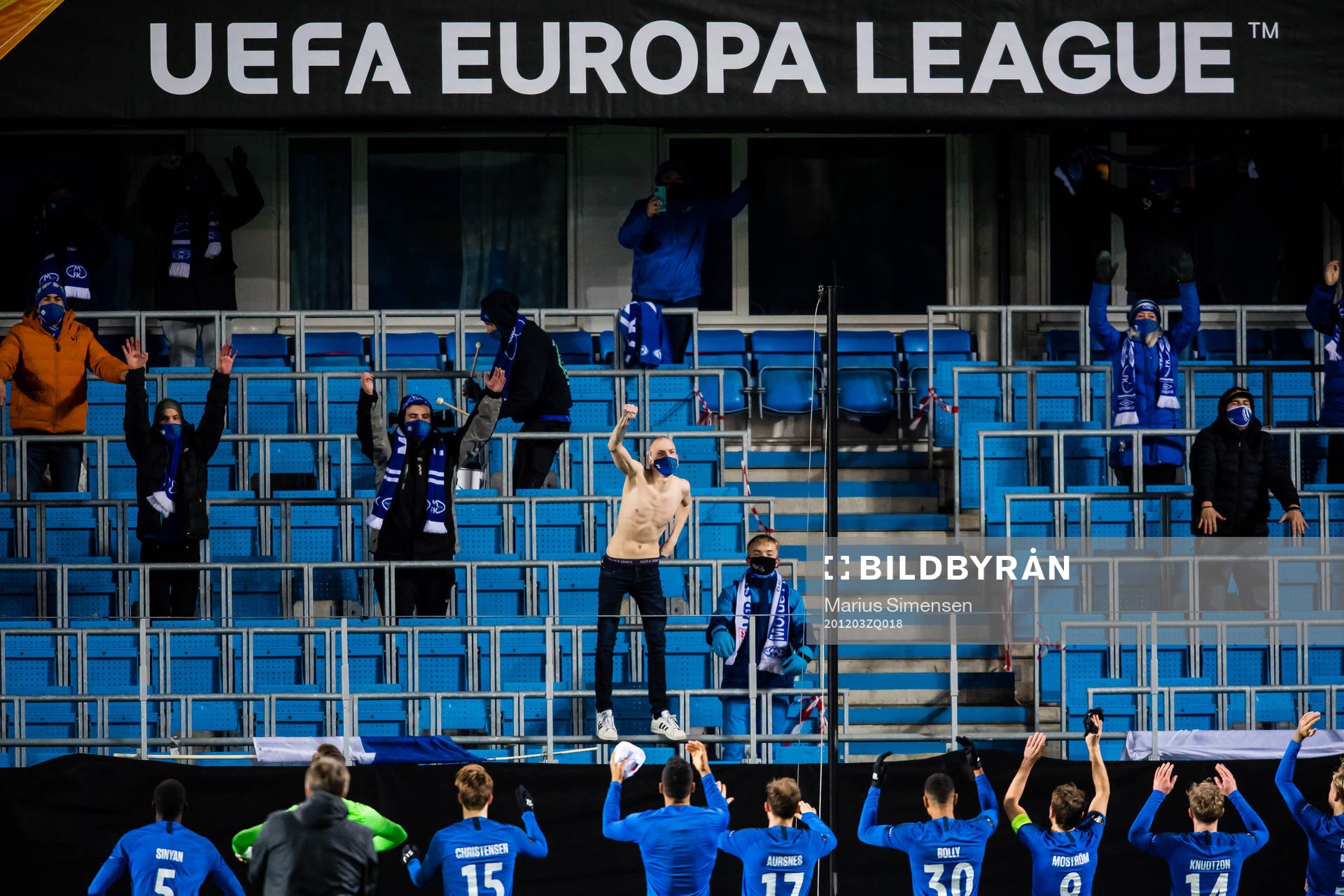 Spectators in the stands celebrates