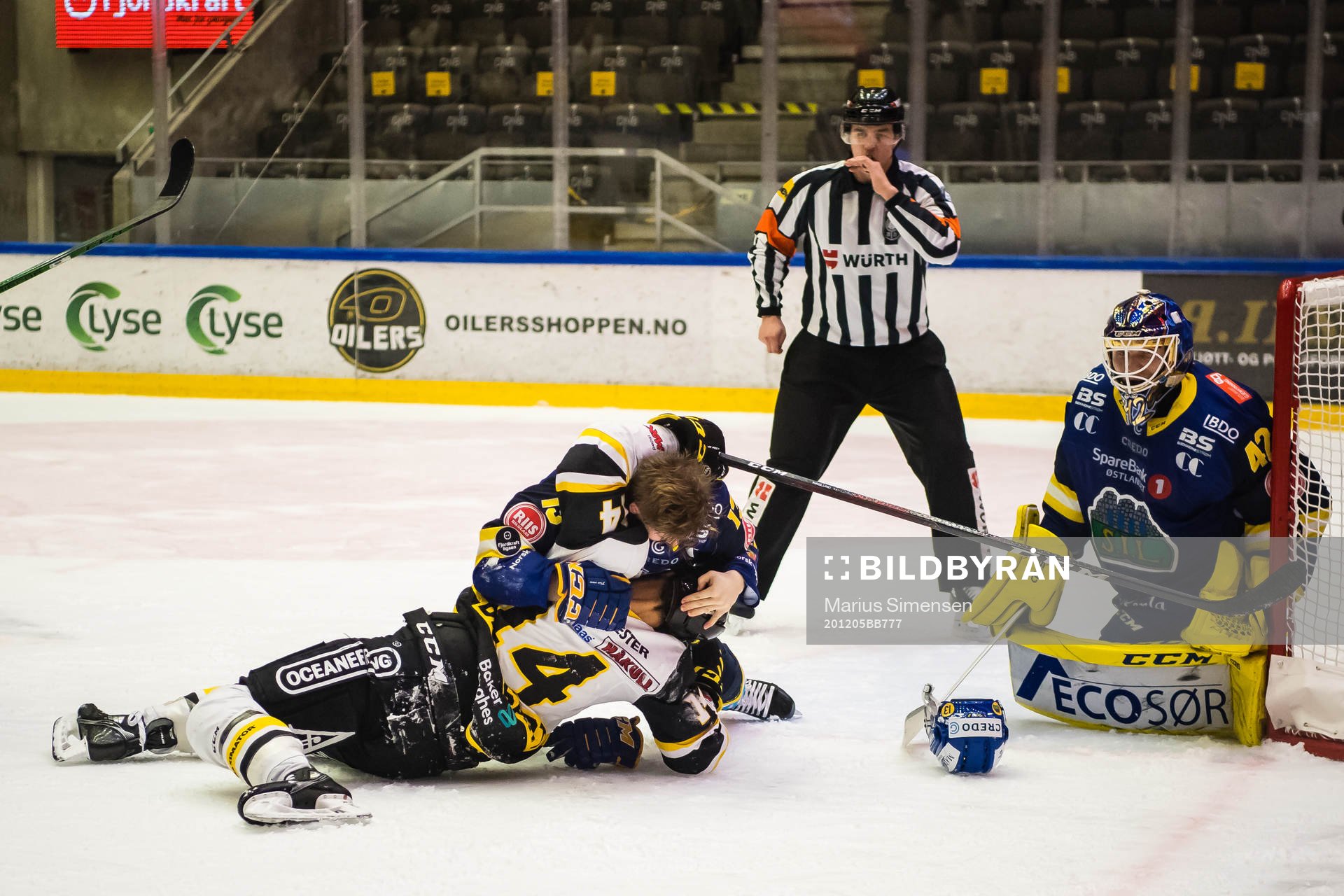 Sondre Bjerke of Storhamar and Brady Maurice Brassart of