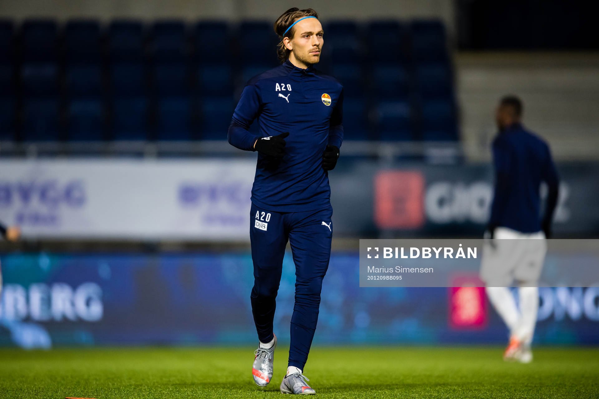 Mikkel Maigaard Jakobsen of Strømsgodset warms up ahead of the Eliteserien match between Aalesund and Strømsgodset on December 9, 2020 in Ålesund.