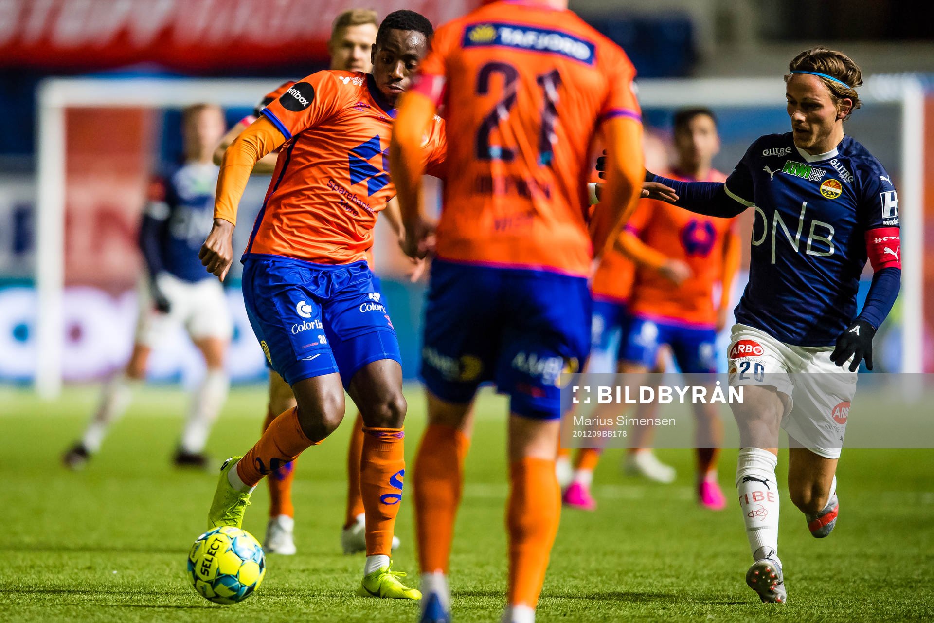Parfait Bizoza of Aalesund and Mikkel Maigaard Jakobsen of