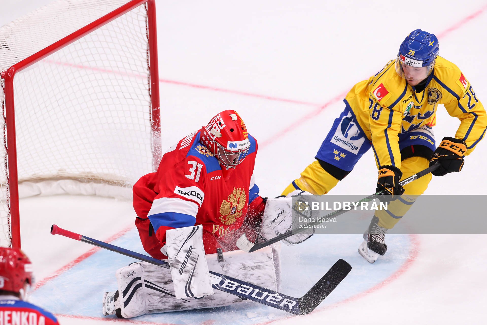 Goalkeeper Alexander Samonov of Russia and Jesper Frödén