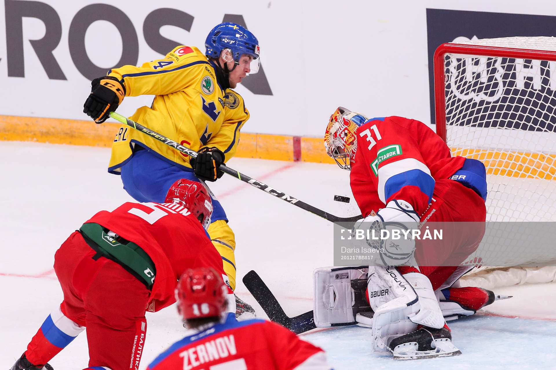 Andreas Wingerli of Sweden against goalkeeper Alexander
