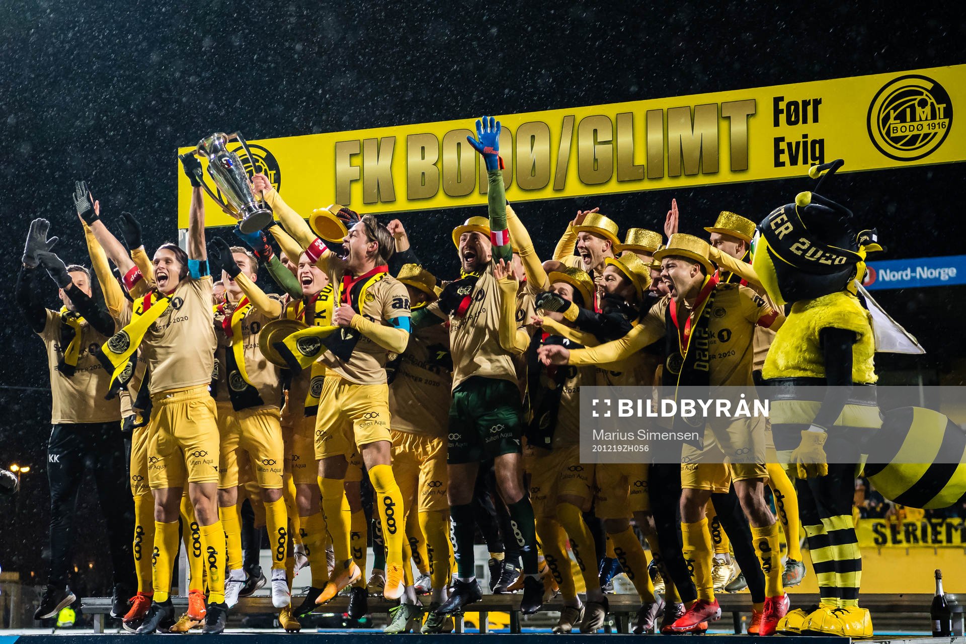 Ulrik Saltnes, Fredrik André Bjørkan, Patrick Berg, Philip Zinckernagel, Kasper Aalund Junker and Sondre Brunstad Fet of Bodø/Glimt celebrates with the trophy after the Eliteserien match between Bodø/Glimt and Viking on December 19, 2020 in Bodø.