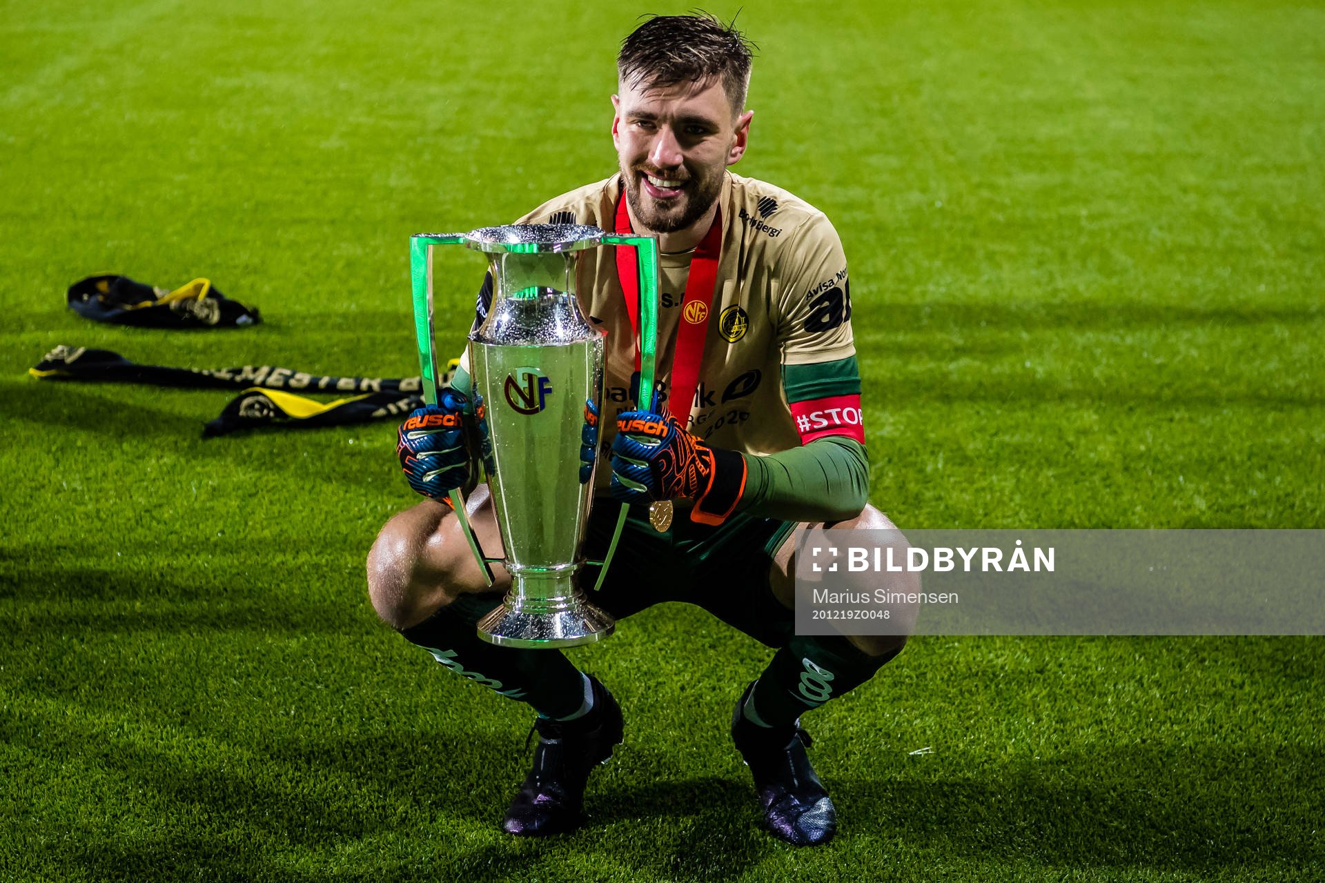 Nikita Haikin of Bodø/Glimt celebrates with the trophy