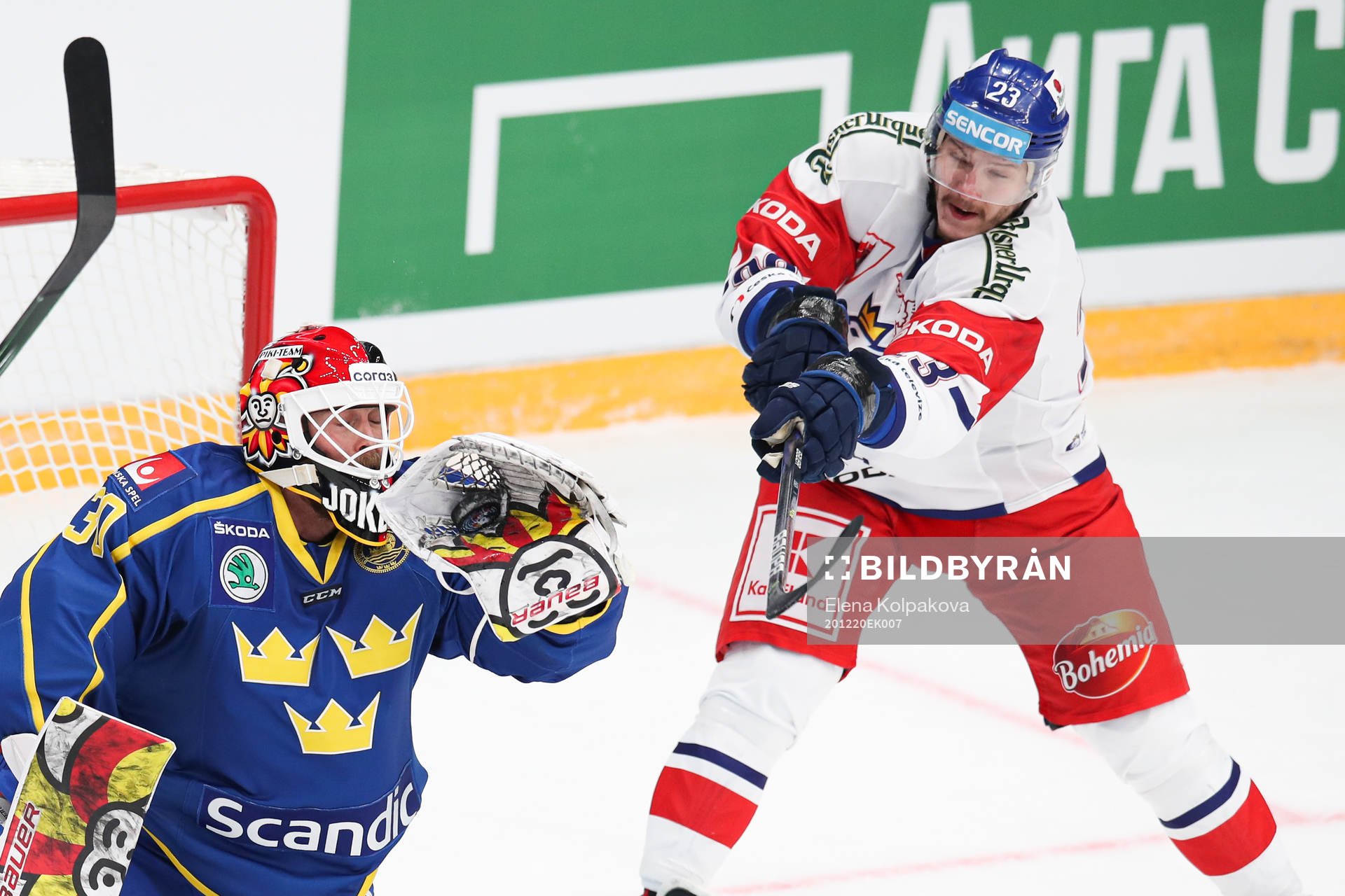 goalkeeper Anders Lindbäck of Sweden and Dmitrij Jaskin