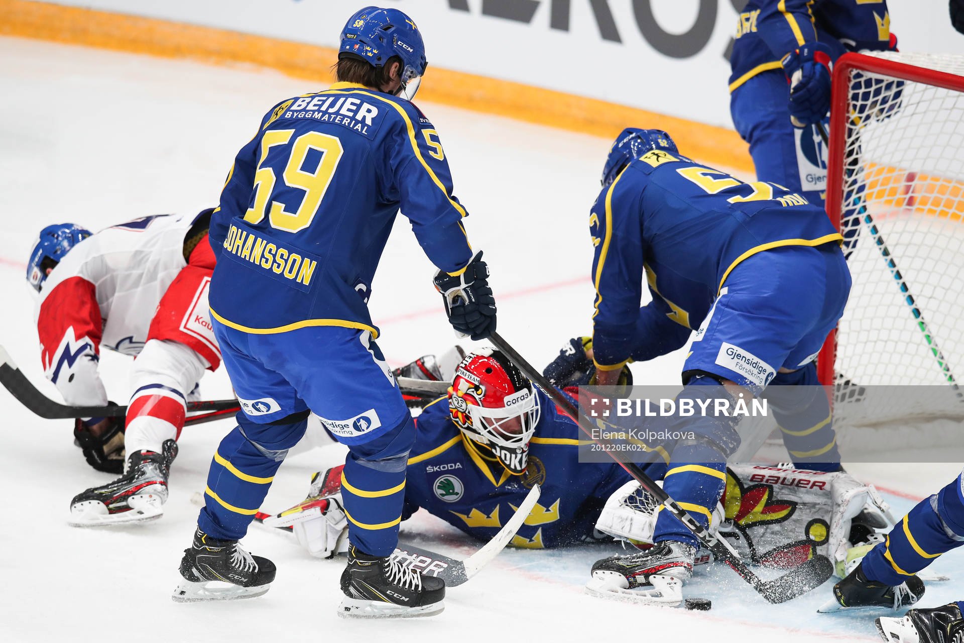Linus Johansson of Sweden goalkeeper Anders Lindbäck ,