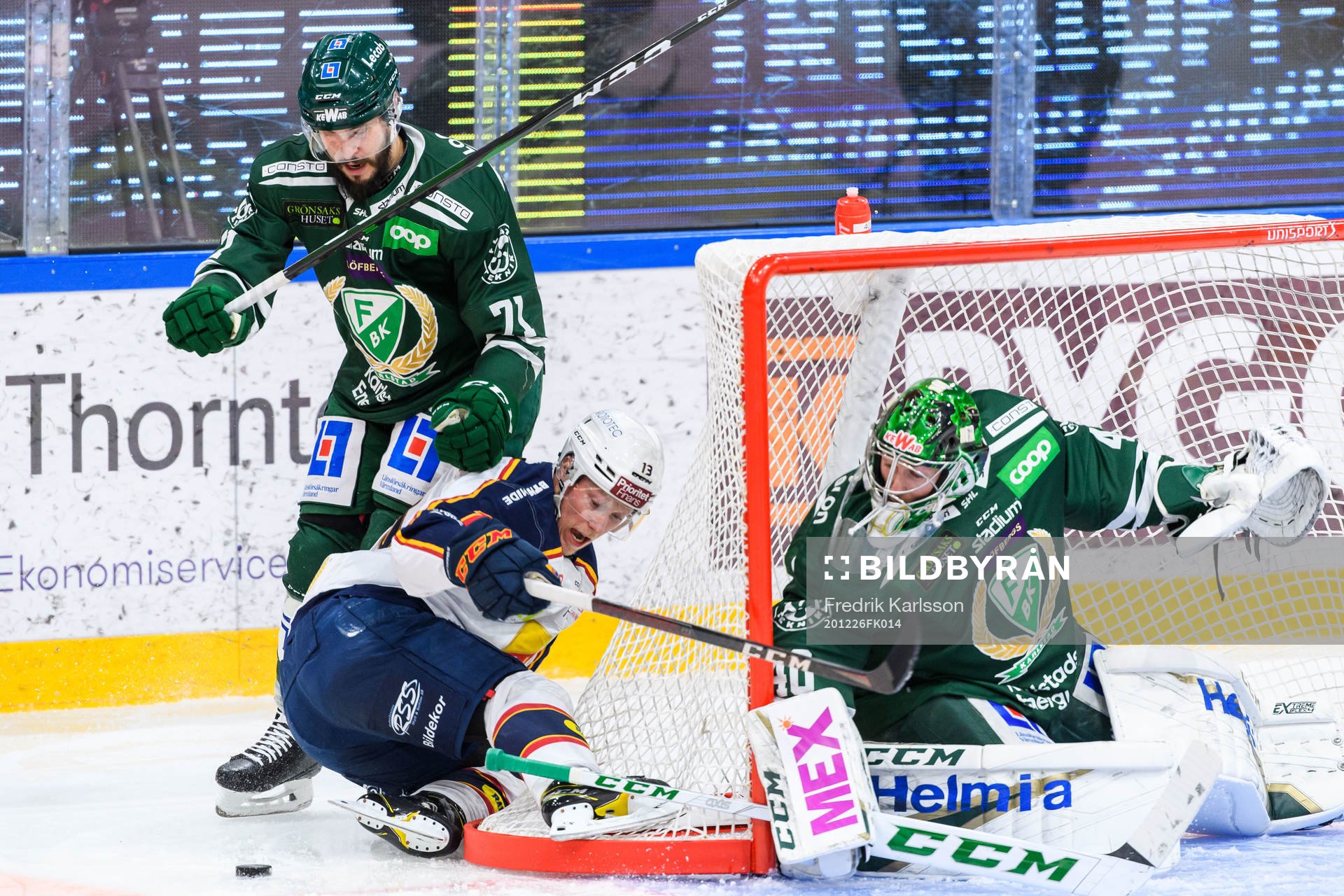 Färjestads Jesse Virtanen och målvakt Henrik Haukeland