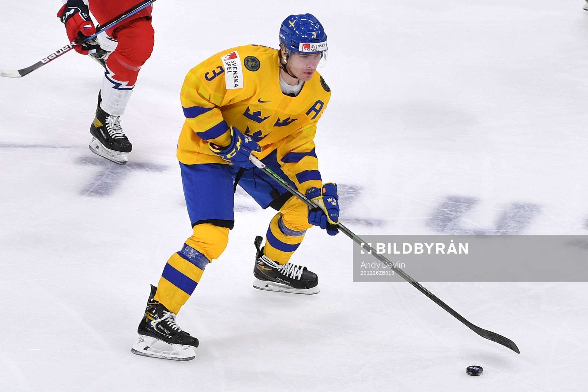 Tobias Björnfot of Sweden carries the puck