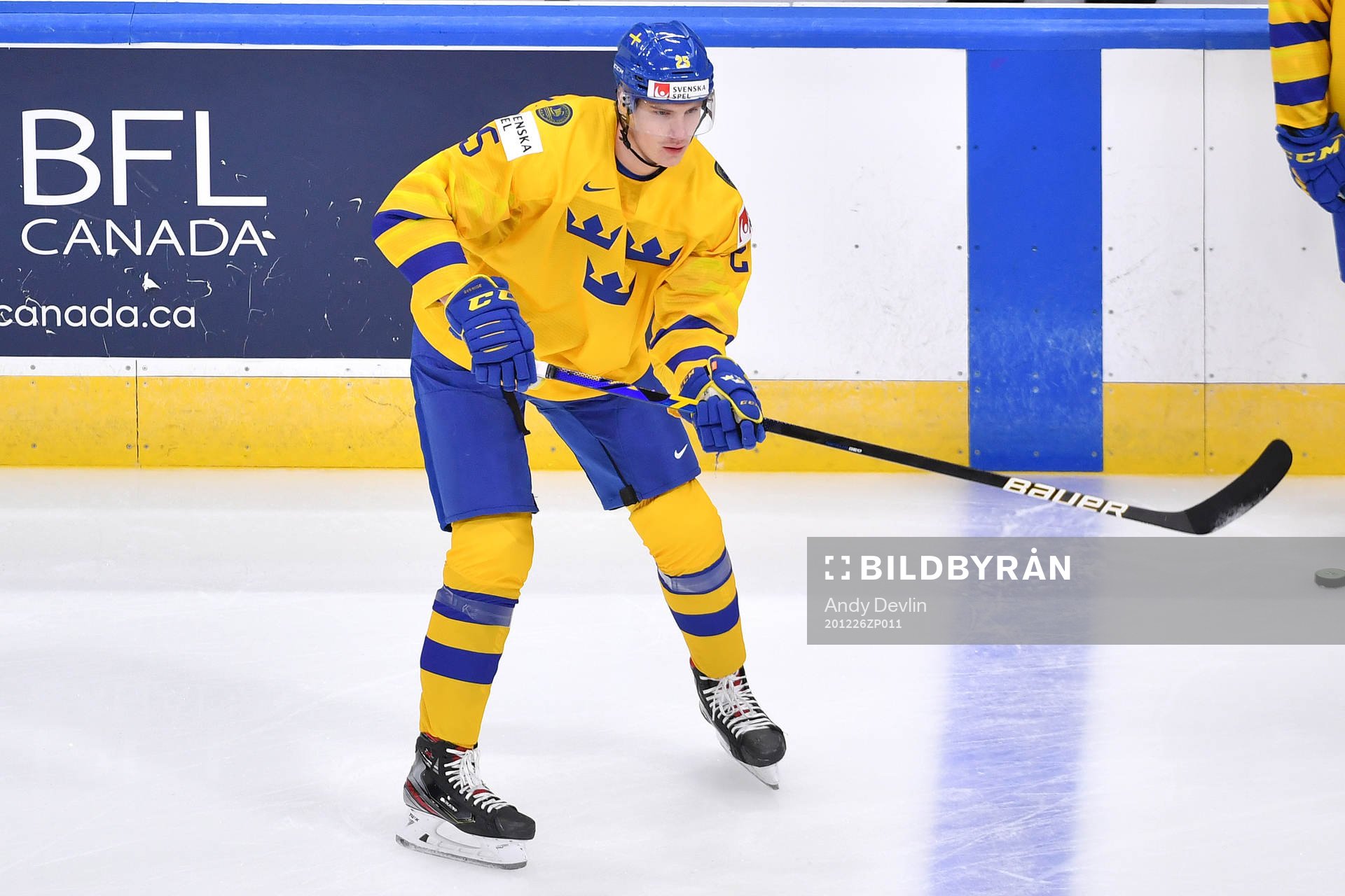 Elmer Söderblom of Sweden passes the puck