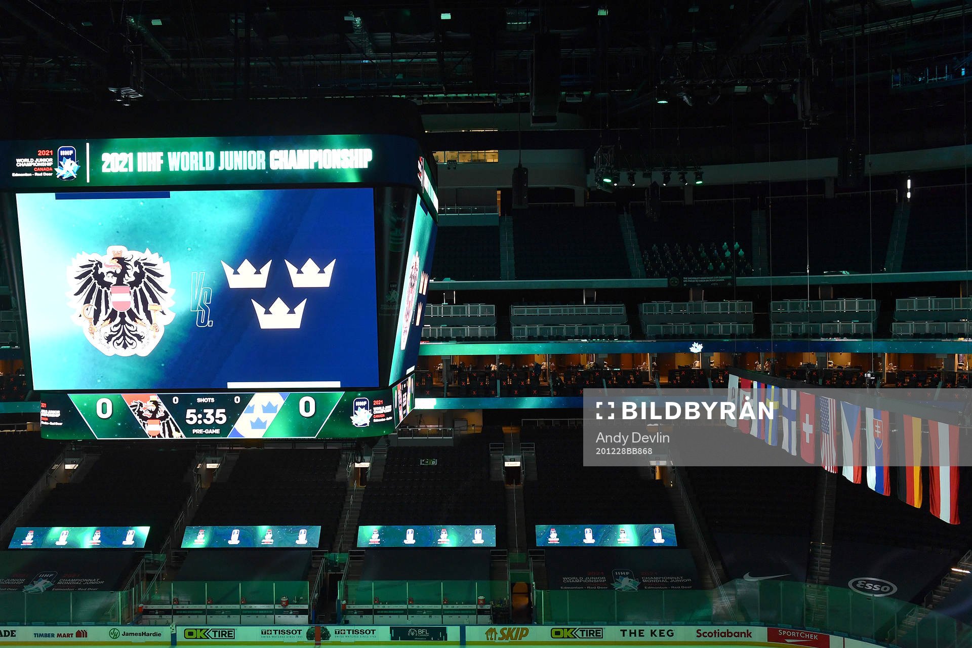 The score clock at Rogers Place displays Austria and Sweden