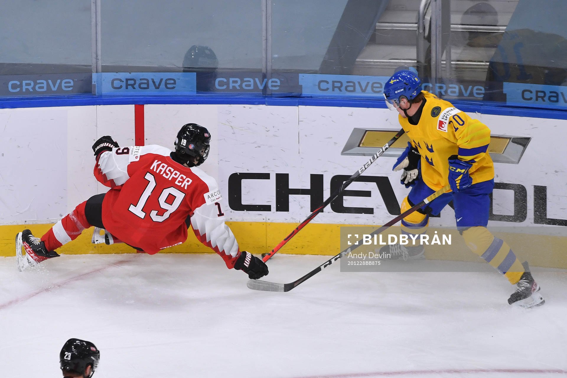 Alexander Holtz of Sweden and Marco Kasper of Austia collide