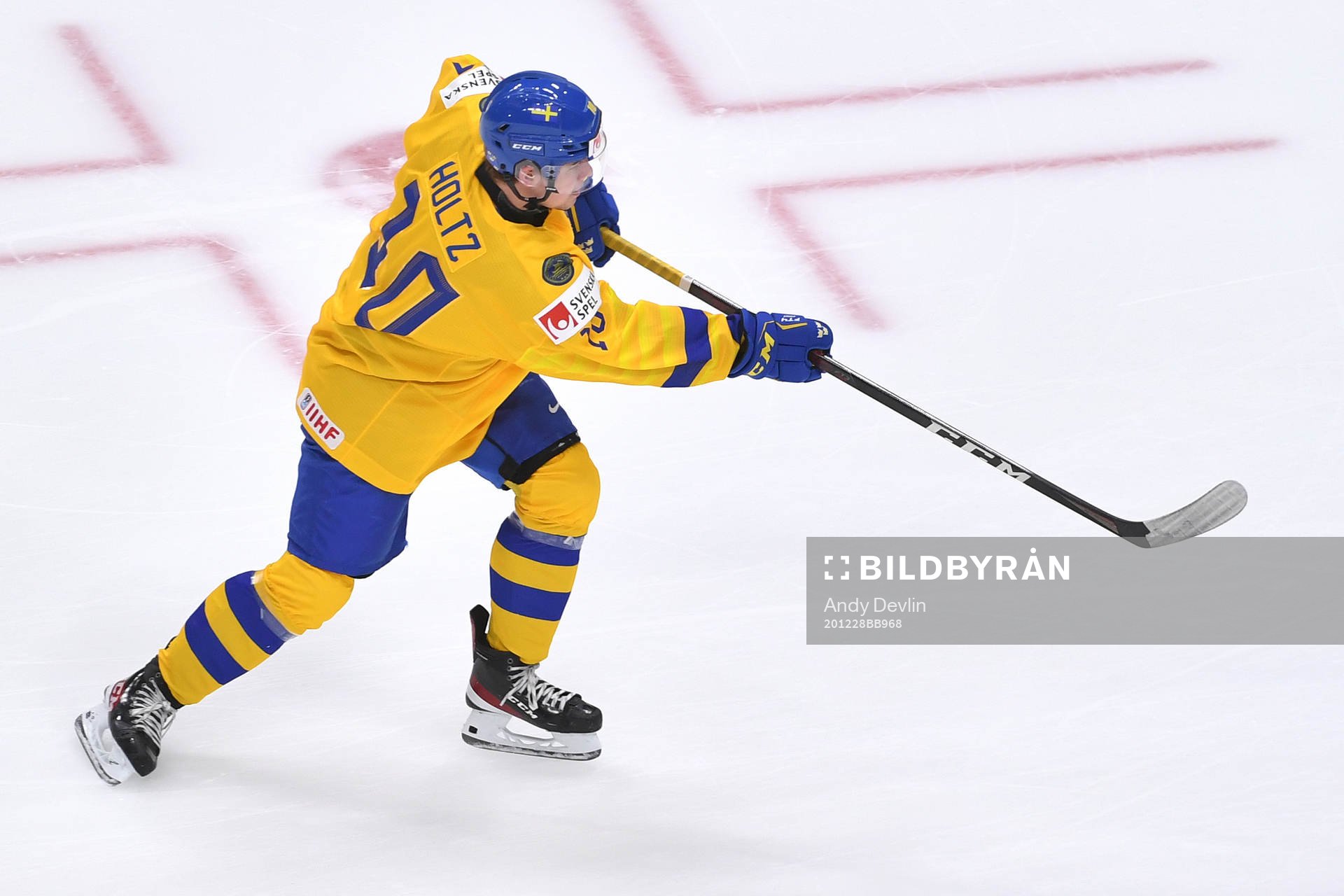 Alexander Holtz of Sweden shoots the puck