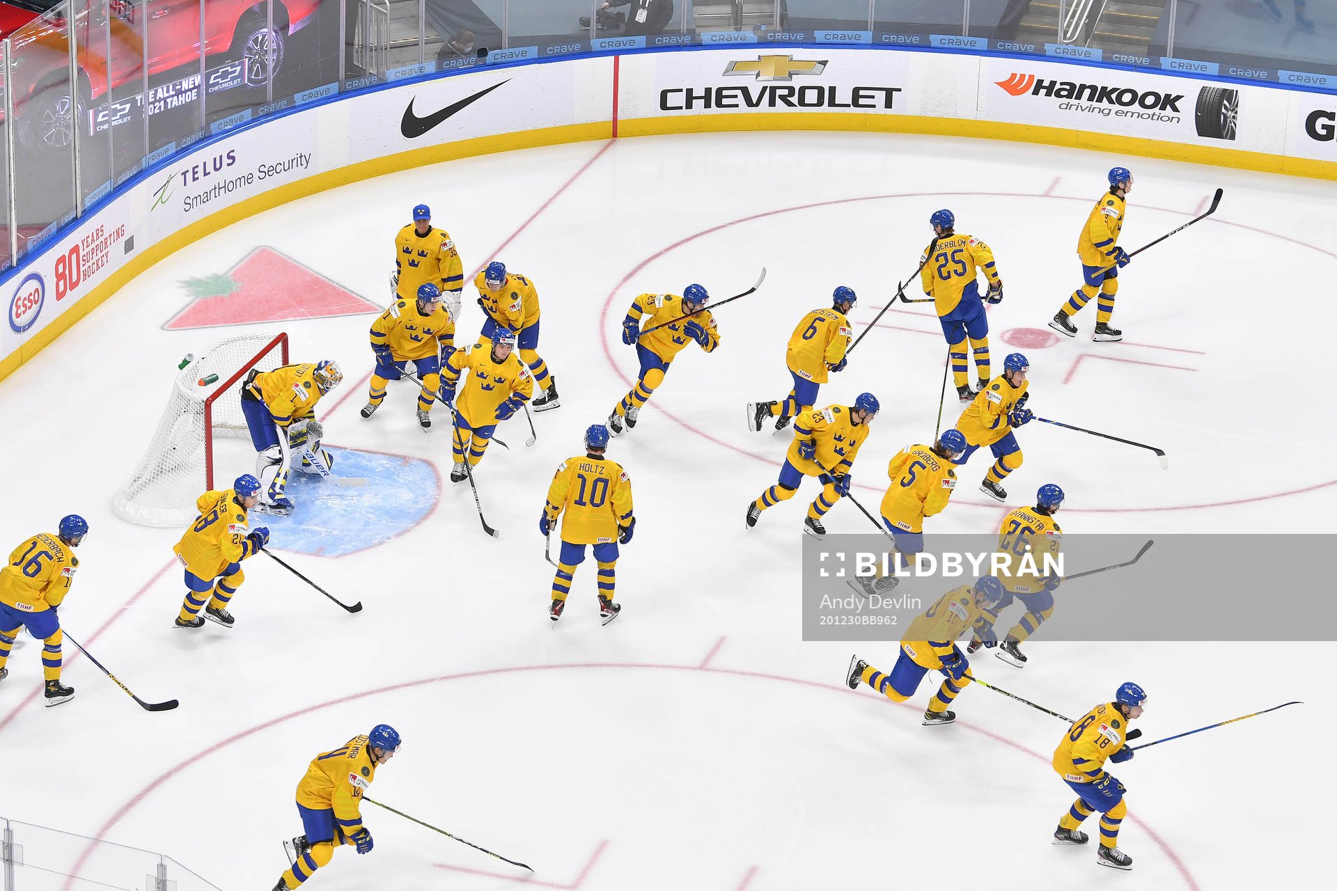 Team Sweden heads to the bench prior to the 2021 IIHF World
