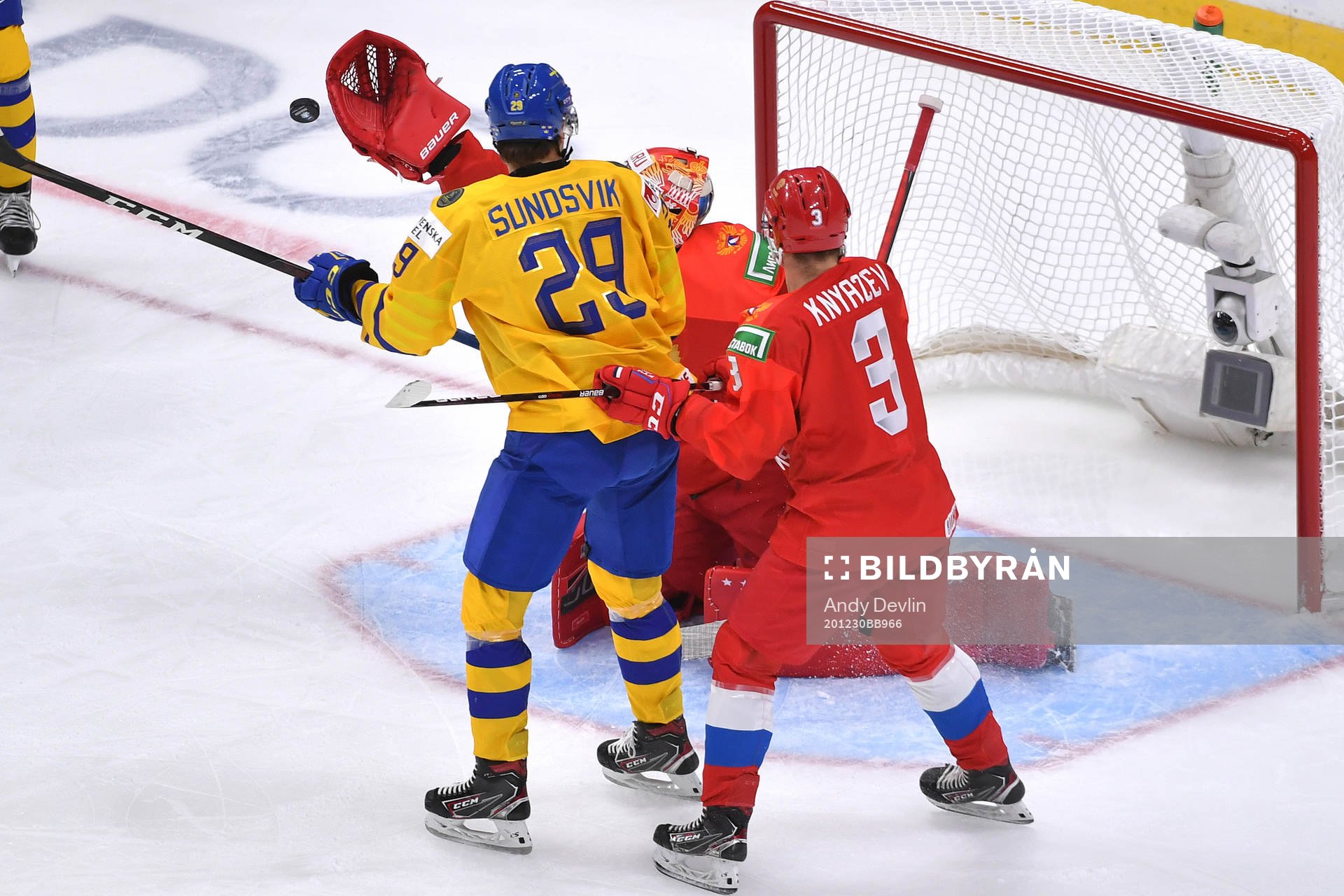 Albin Sundsvik of Sweden attempts to screen Yaroslav