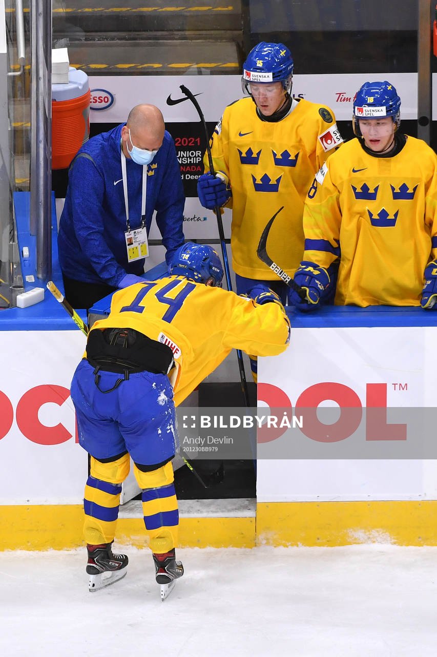 Arvid Costmar of Sweden leaves the ice