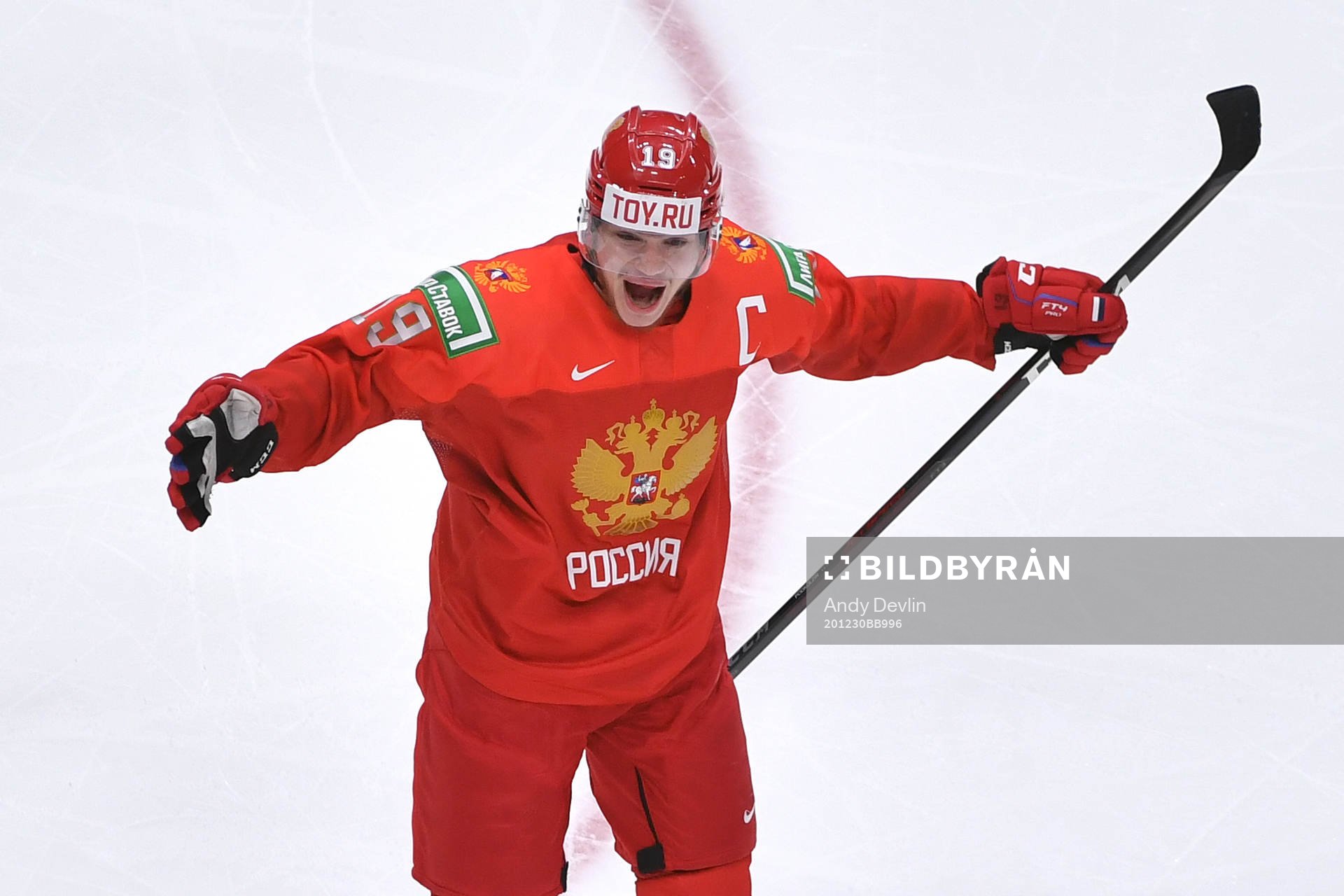 Russian captain Vasili Podkolzin celebrates the team's 3-2