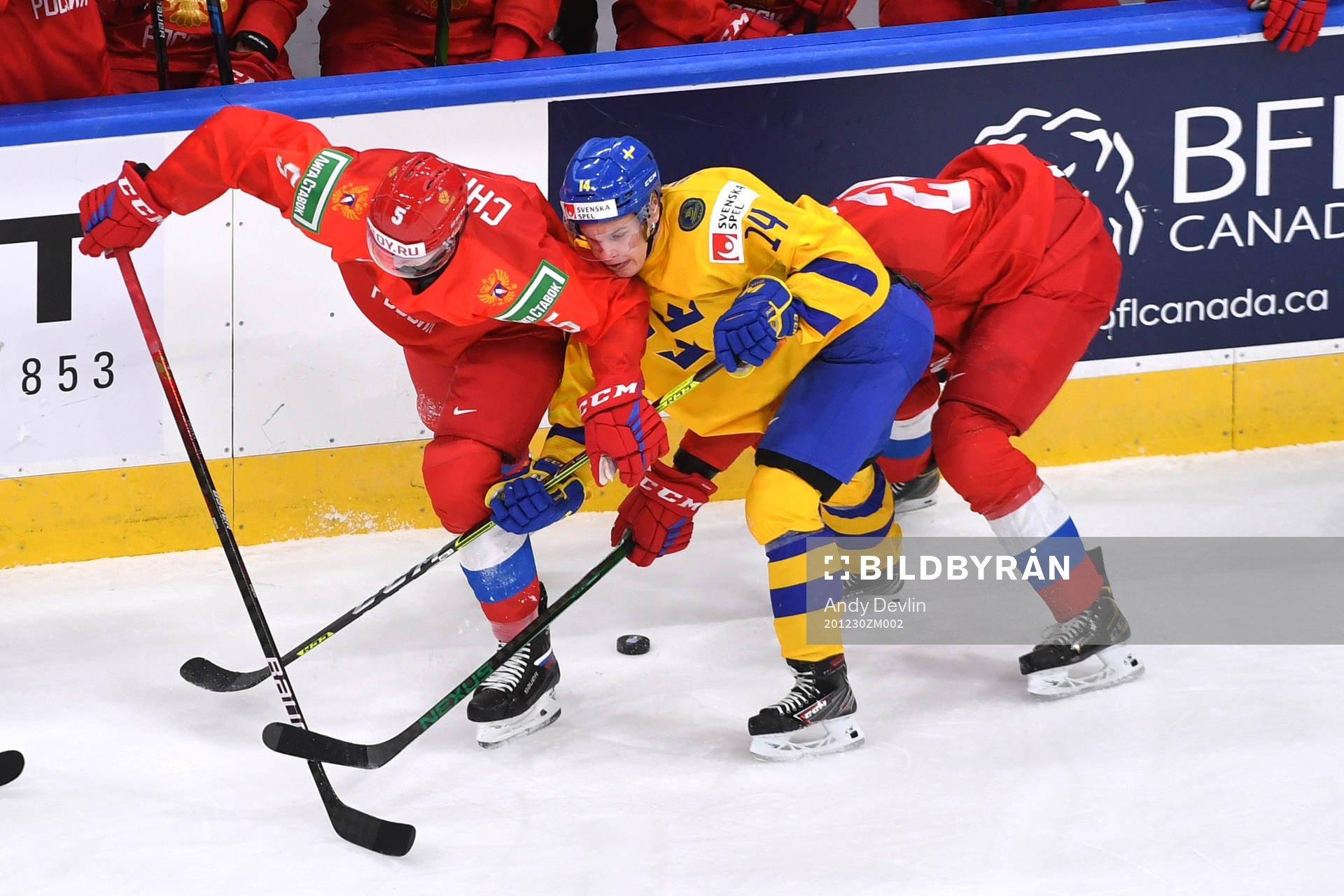 Arvid Costmar of Sweden battles with Danil Chaika of Russia