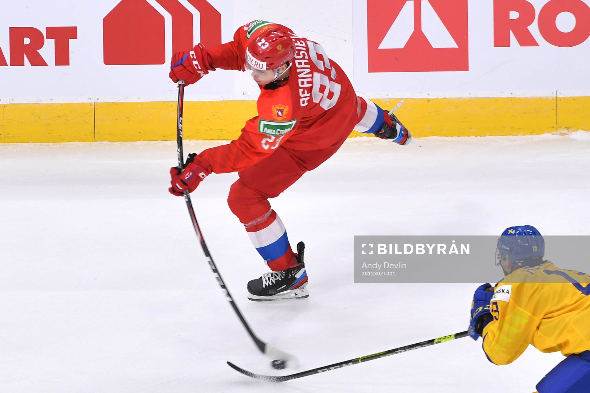 Yegor Afanasiev of Russia shoots the puck