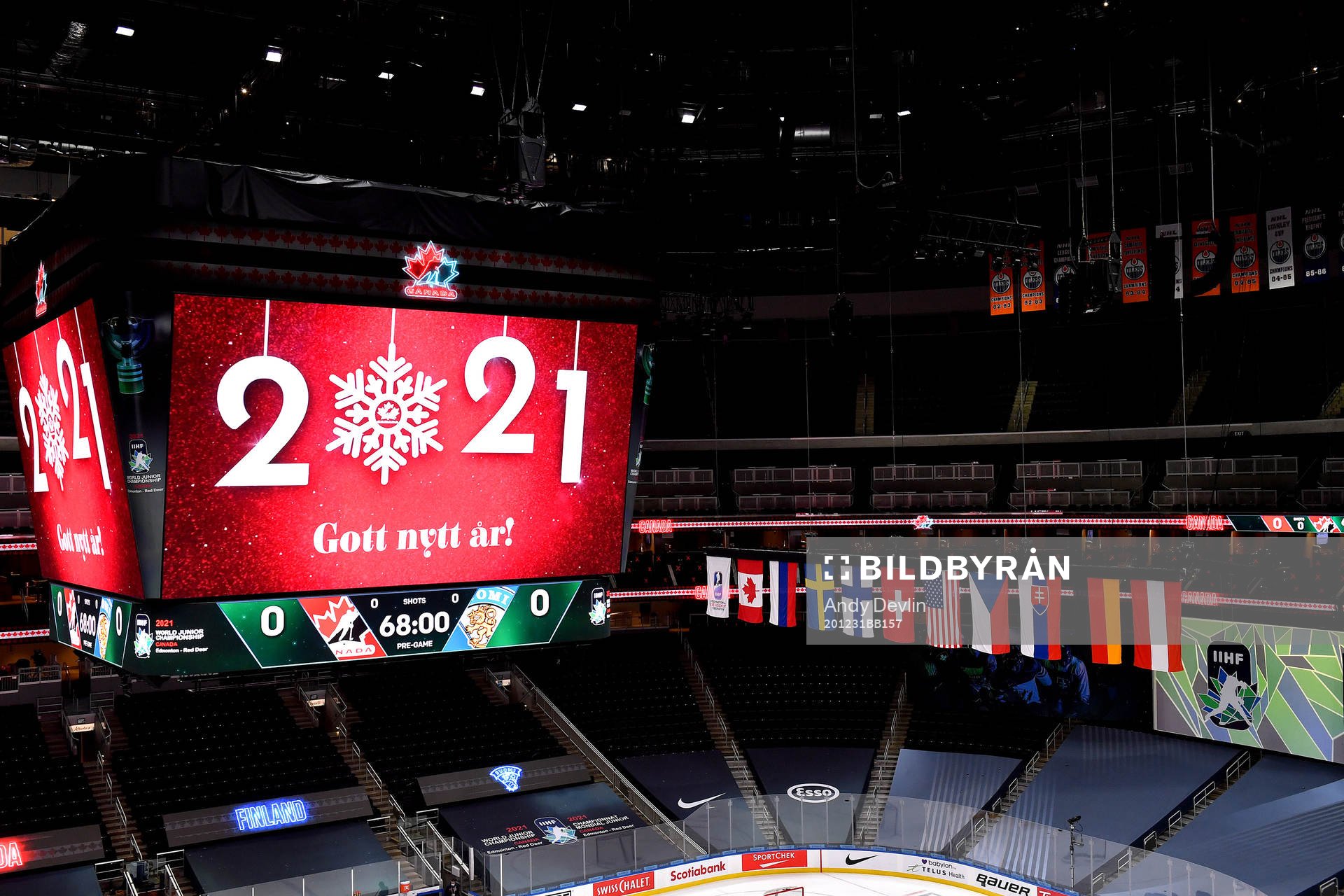The score clock at Rogers Place displays New Year's wishes