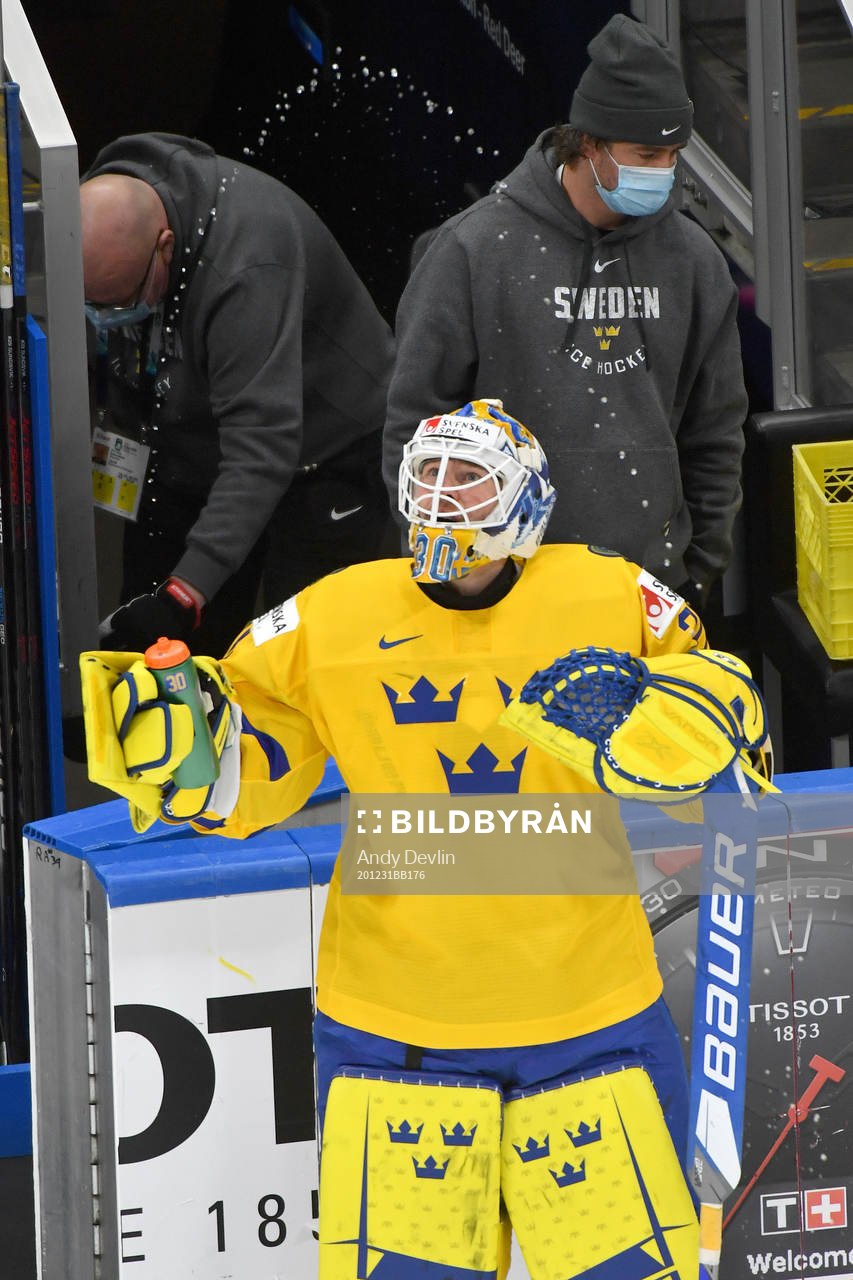 Hugo Alnefelt of Sweden sprays water in the air