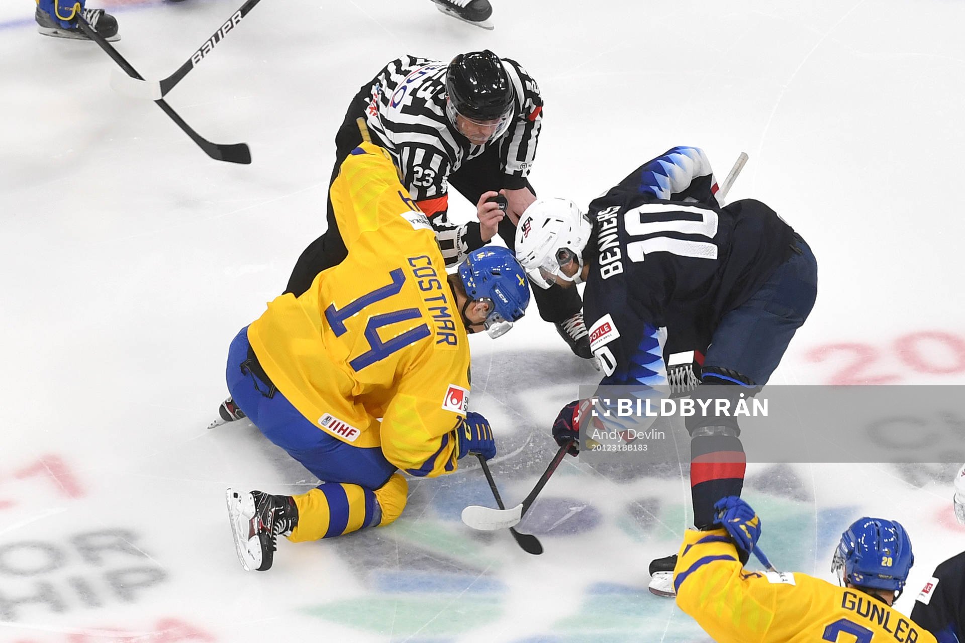 Arvid Costmar of Sweden and Matthew Beniers of USA face off