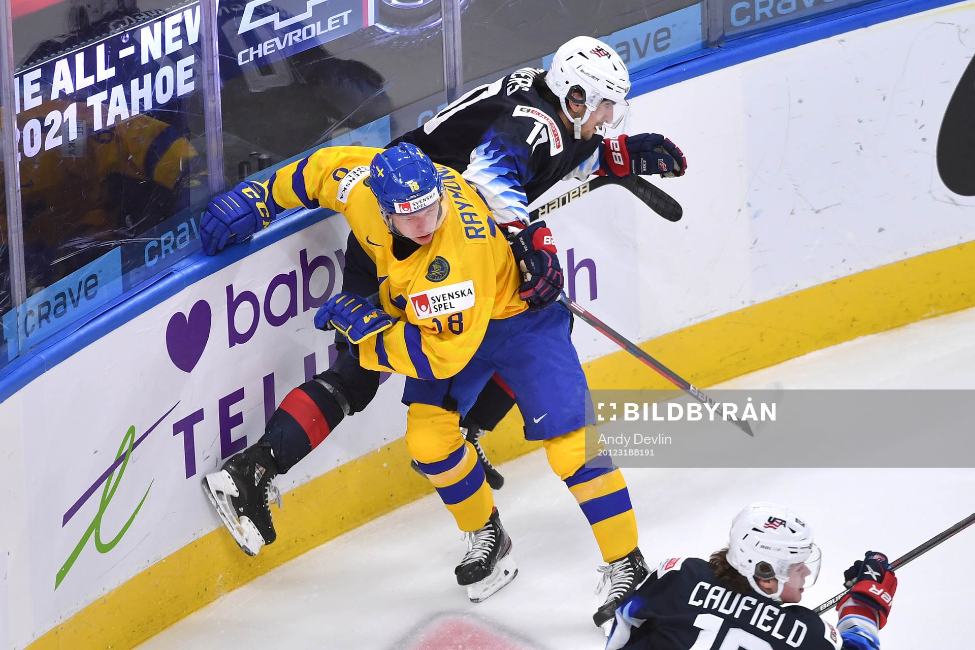 Matthew Beniers of USA and Lucas Raymond of Sweden collide
