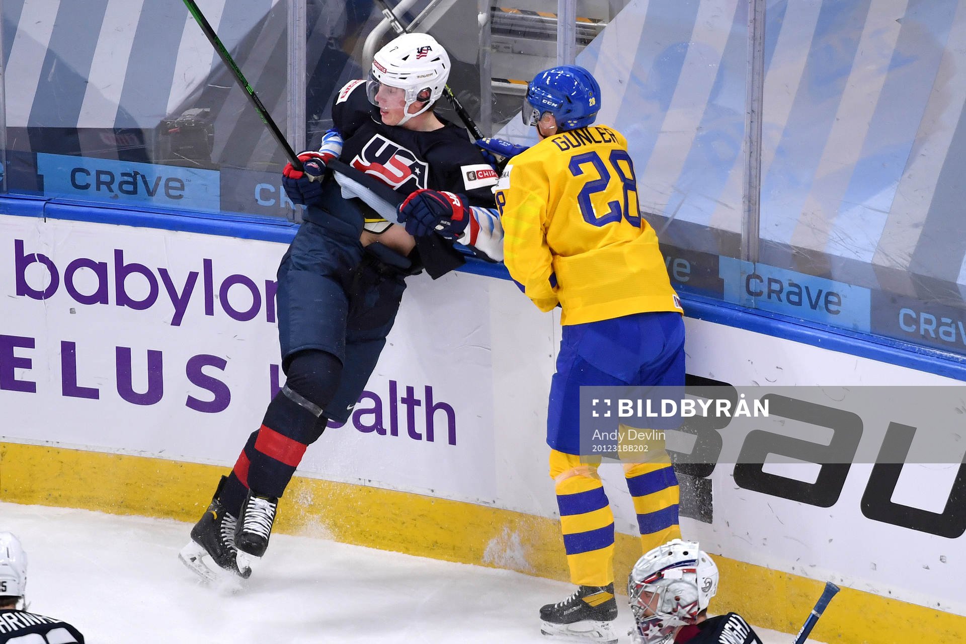 Noel Gunler of Sweden and Tyler Kleven of USA collide