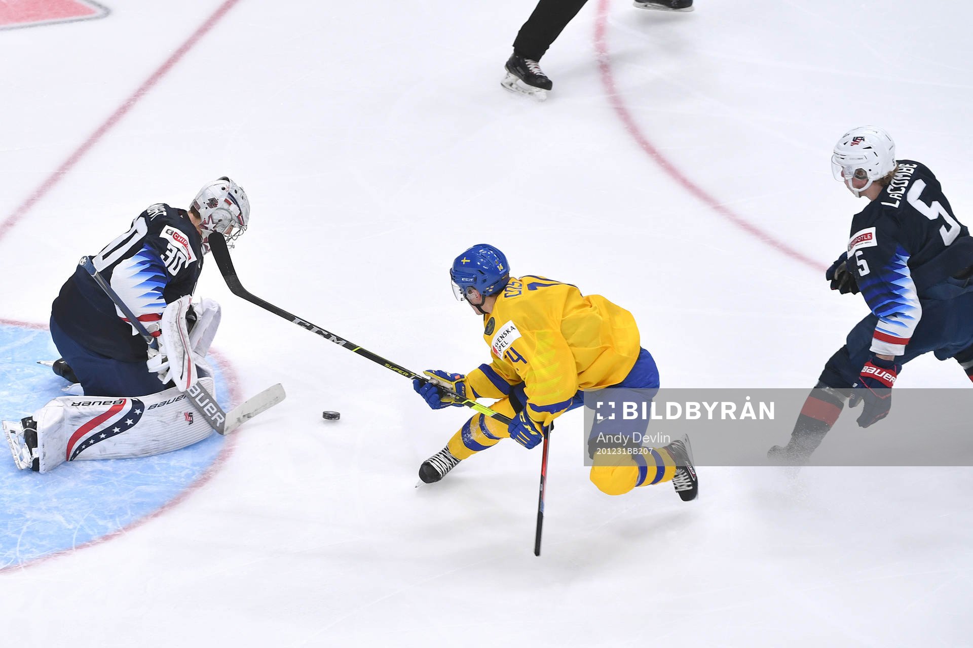 Arvid Costmar of Sweden is hooked by Jackson LaCombe of USA