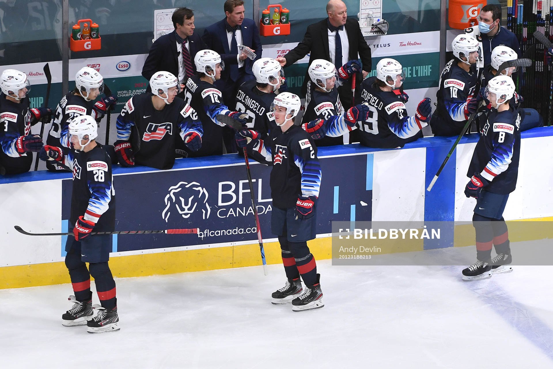 Arthur Kaliyev, Drew Helleson and Jake Sanderson of USA